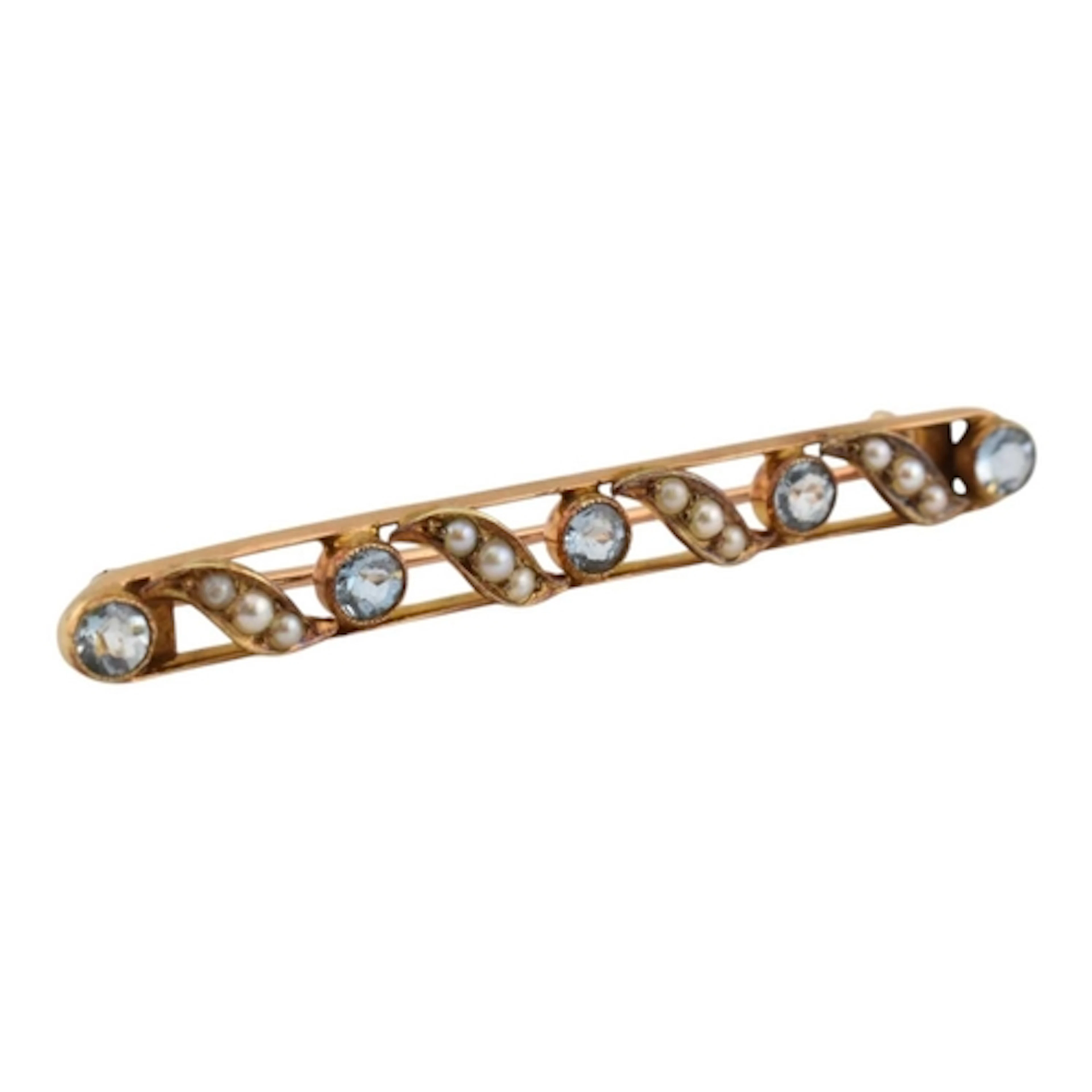 A 14ct gold aquamarine and pearl bar brooch pin. The brooch ...
