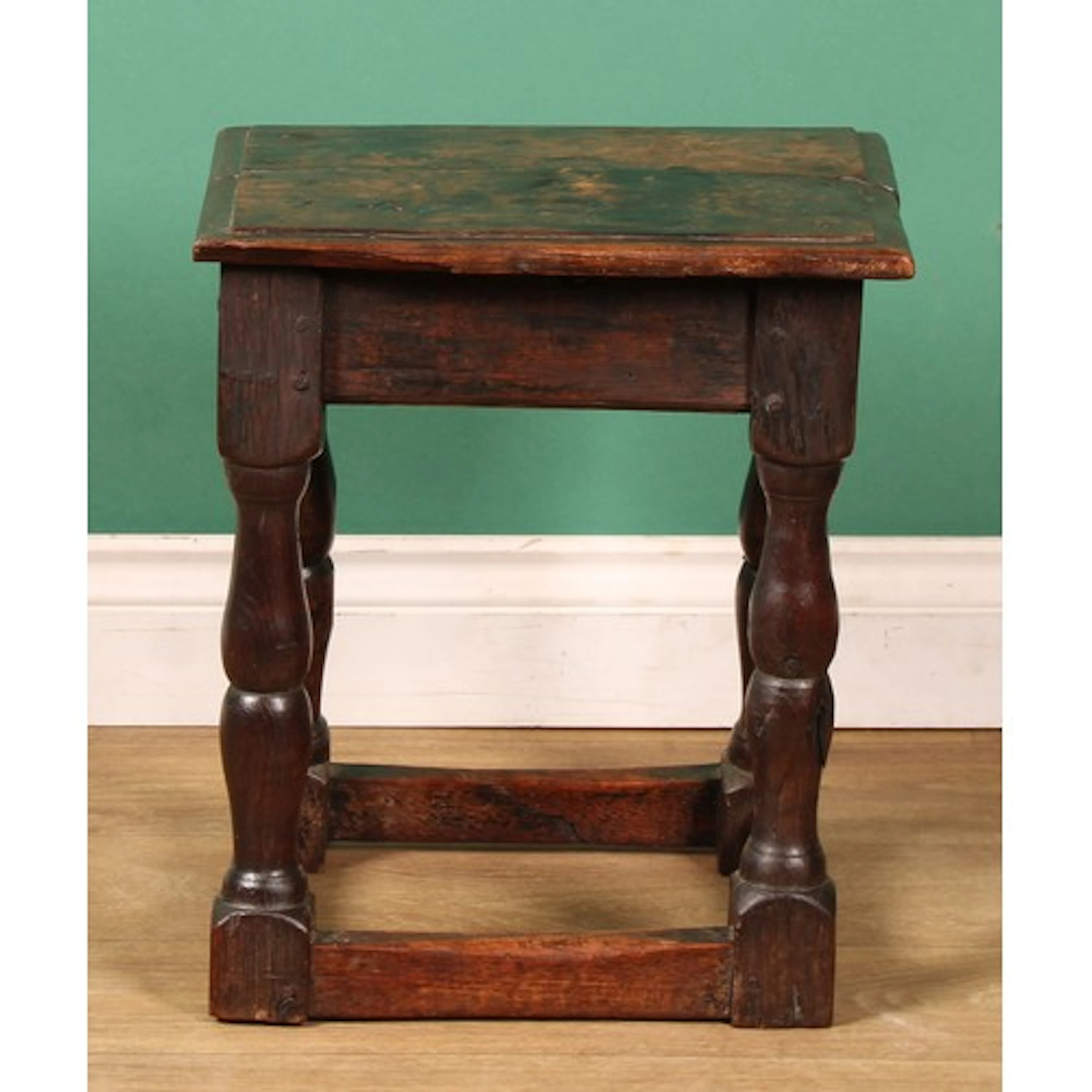 A William III oak joint stool, 46cm high, 38cm wide, 28cm de...