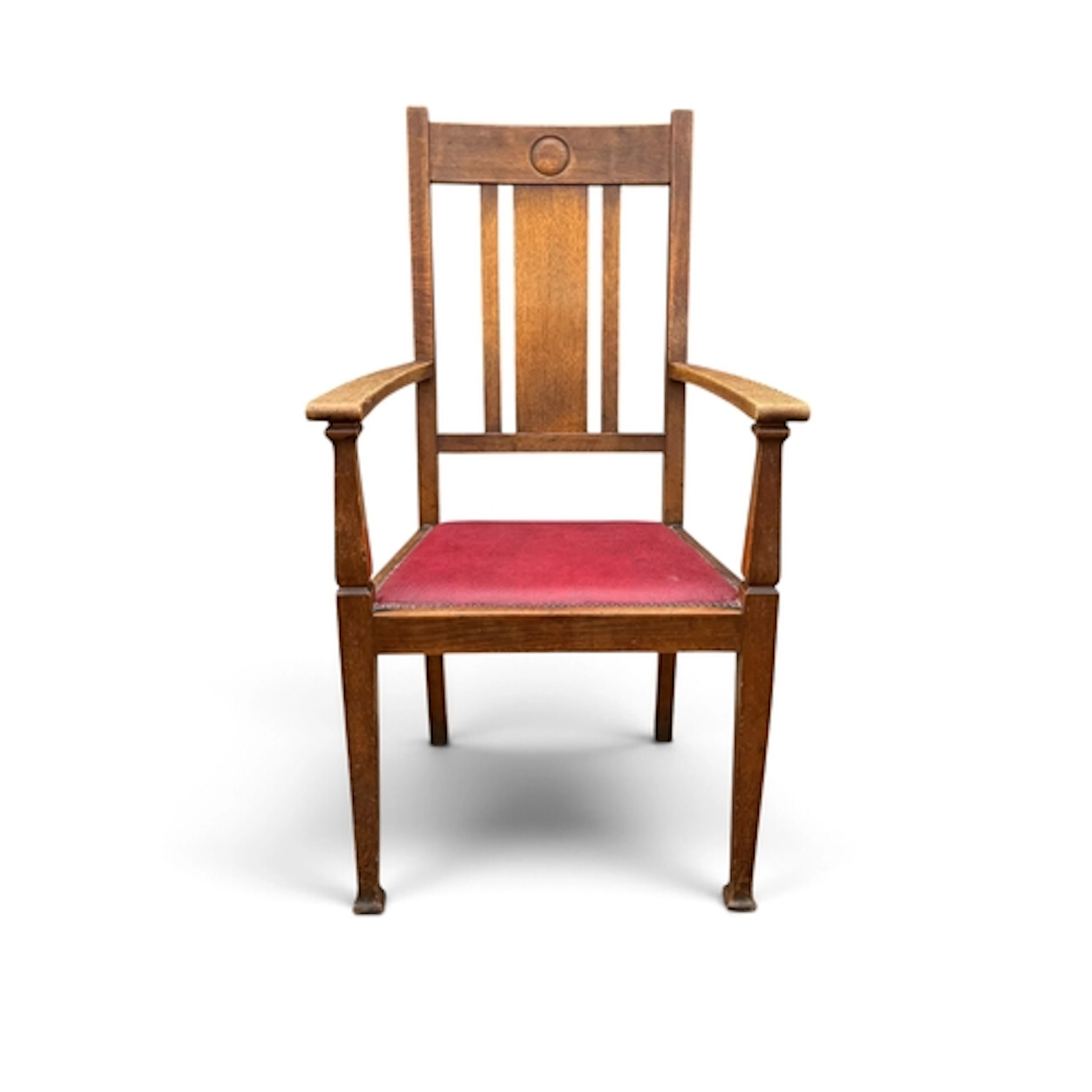 AN ARTS AND CRAFTS OAK OPEN ARM ELBOW CHAIR The seat upholst...