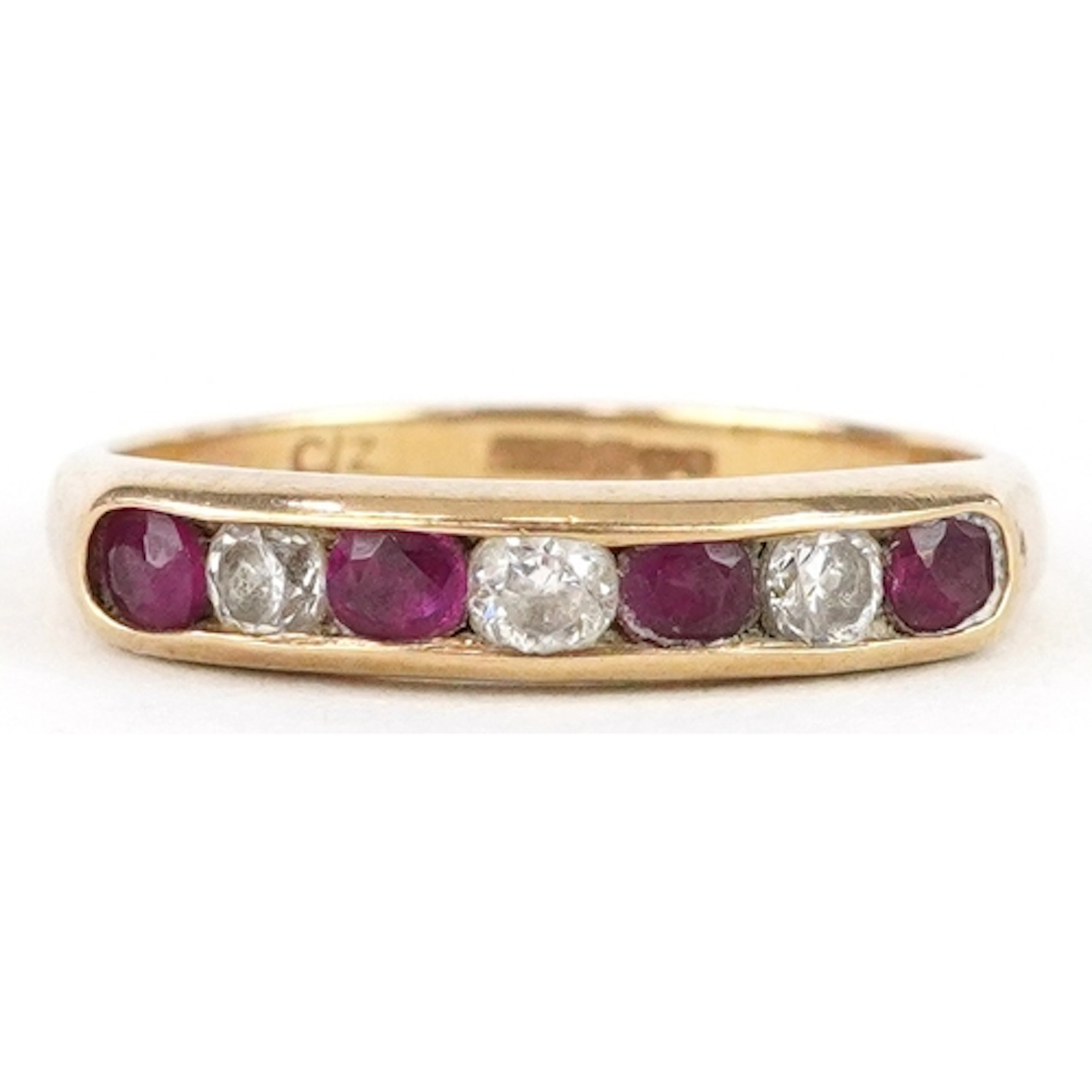 9ct gold pink stone and cubic zirconia half eternity ring, s...