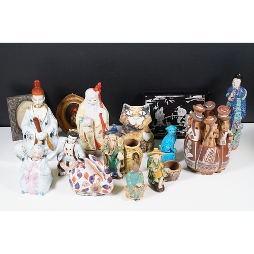 Collection of Chinese porcelain figures, comprising mudmen f...