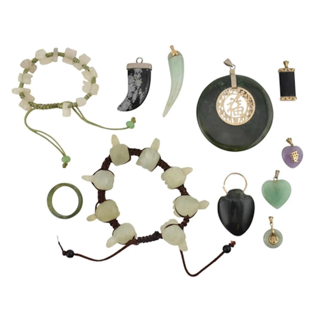 Collection of contemporary jade and hard stone jewellery. El...