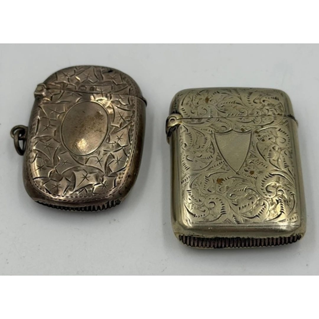 Two ornate silver vesta cases, various makers and hallmarks...