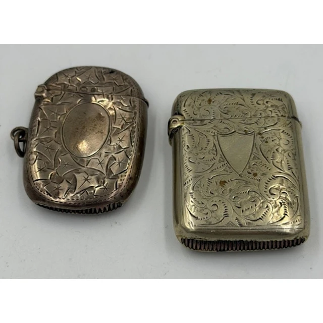 Two ornate silver vesta cases, various makers and hallmarks...