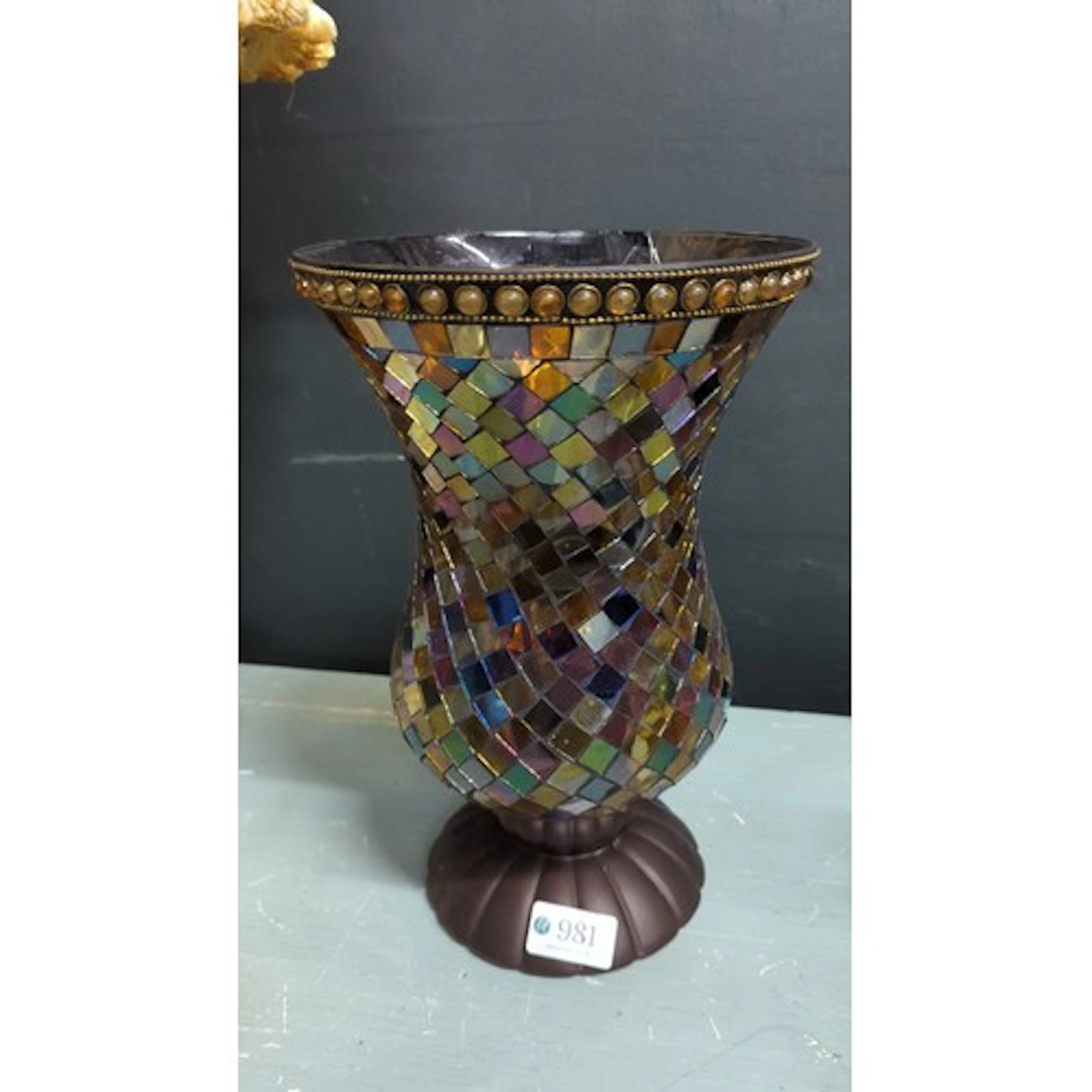 A mosaic-glass tapering hurricane candle lamp, in iridescent...