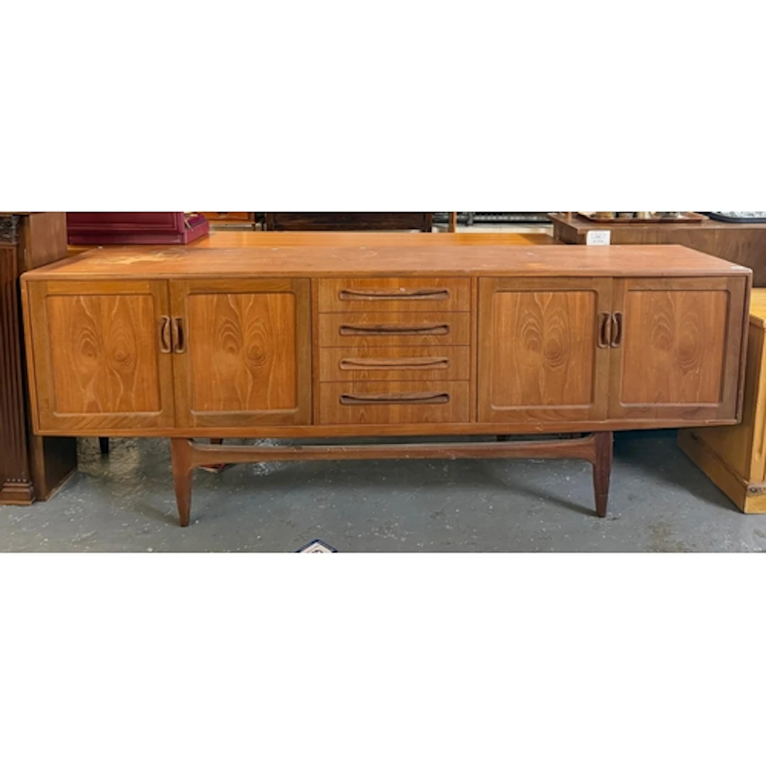 Mid century Times Furnishings teak low sideboard, having fou...