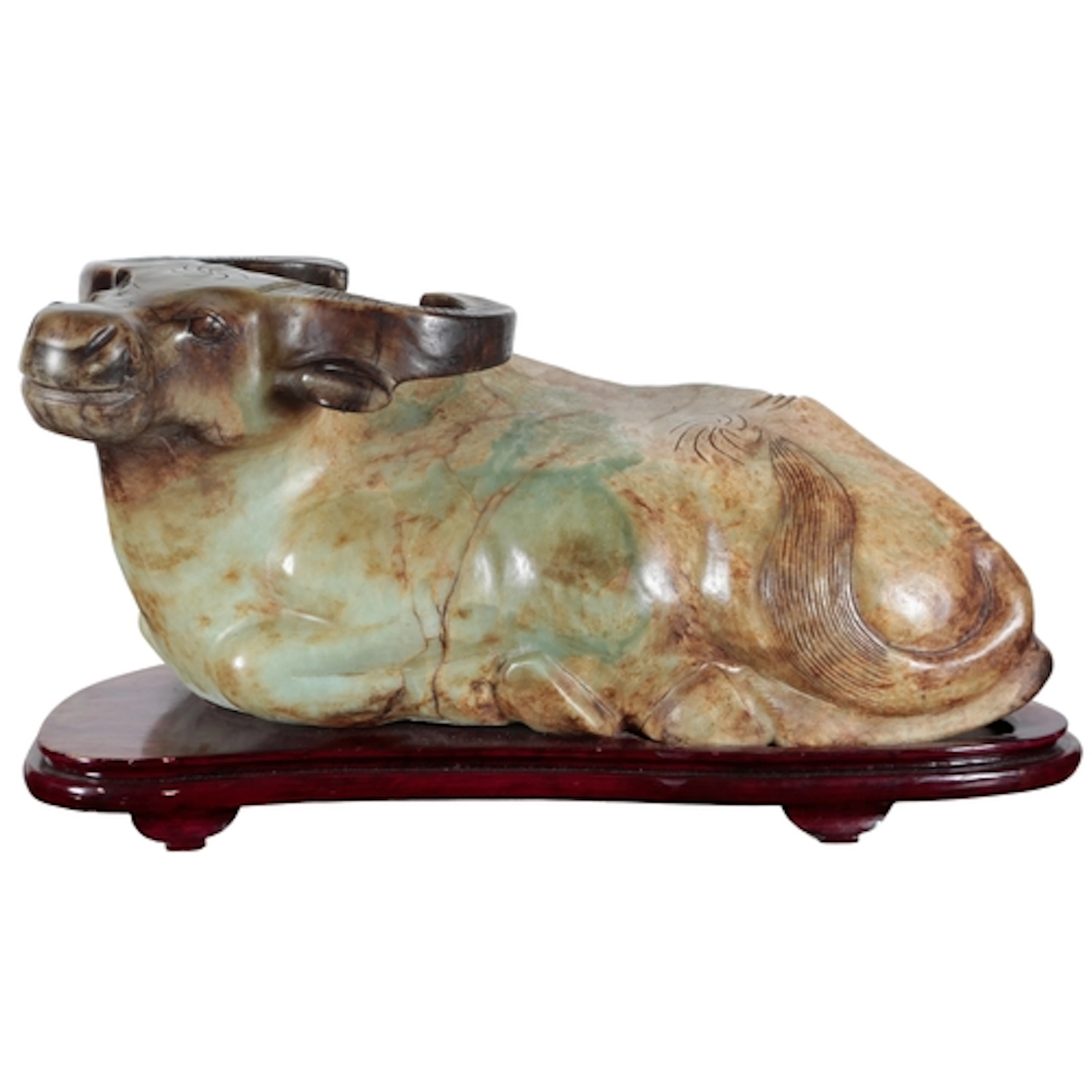 A massive Chinese bowenite jade figure of a recumbent buffal...
