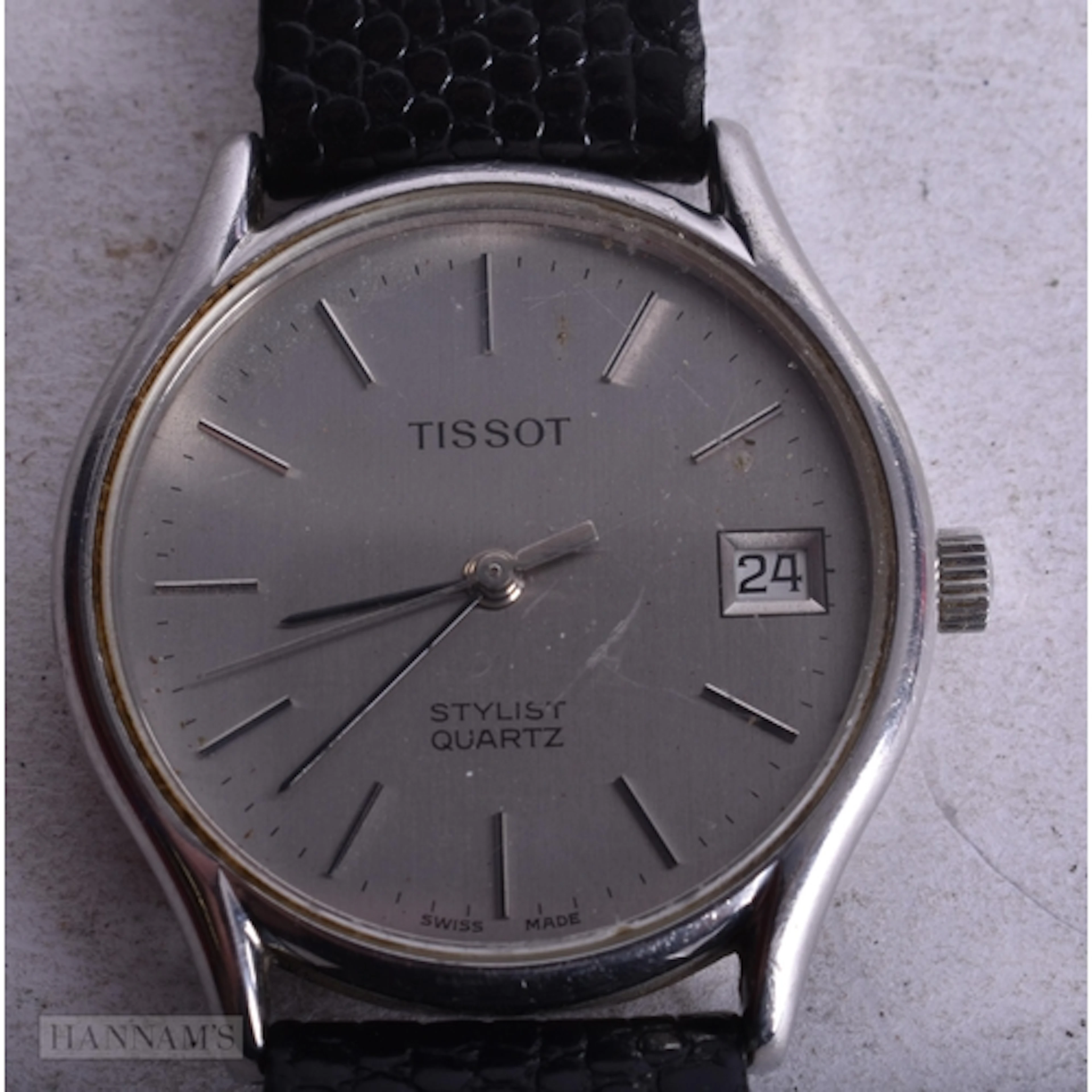A Tissot Quartz Watch. 3.3cm incl crown. Not working