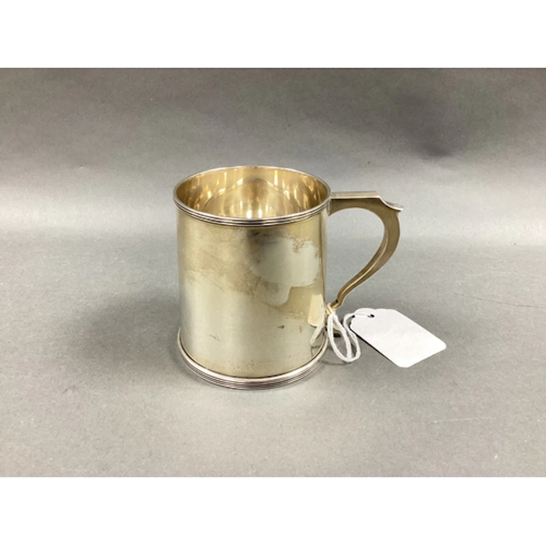A Hallmarked Silver Handled Button Hook, together with a sma...