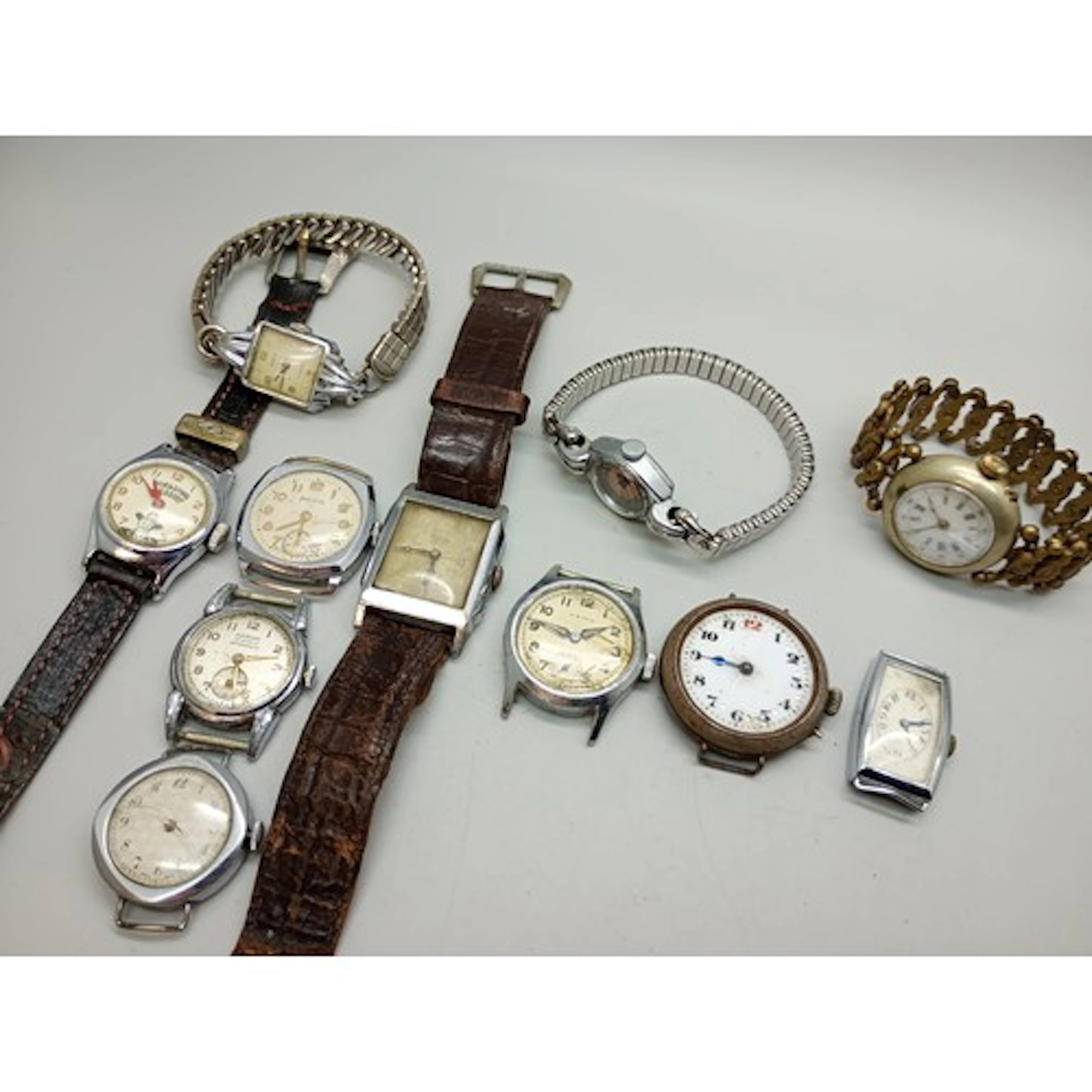 A collection of watches including Hopalong Cassidy, Helvetia...