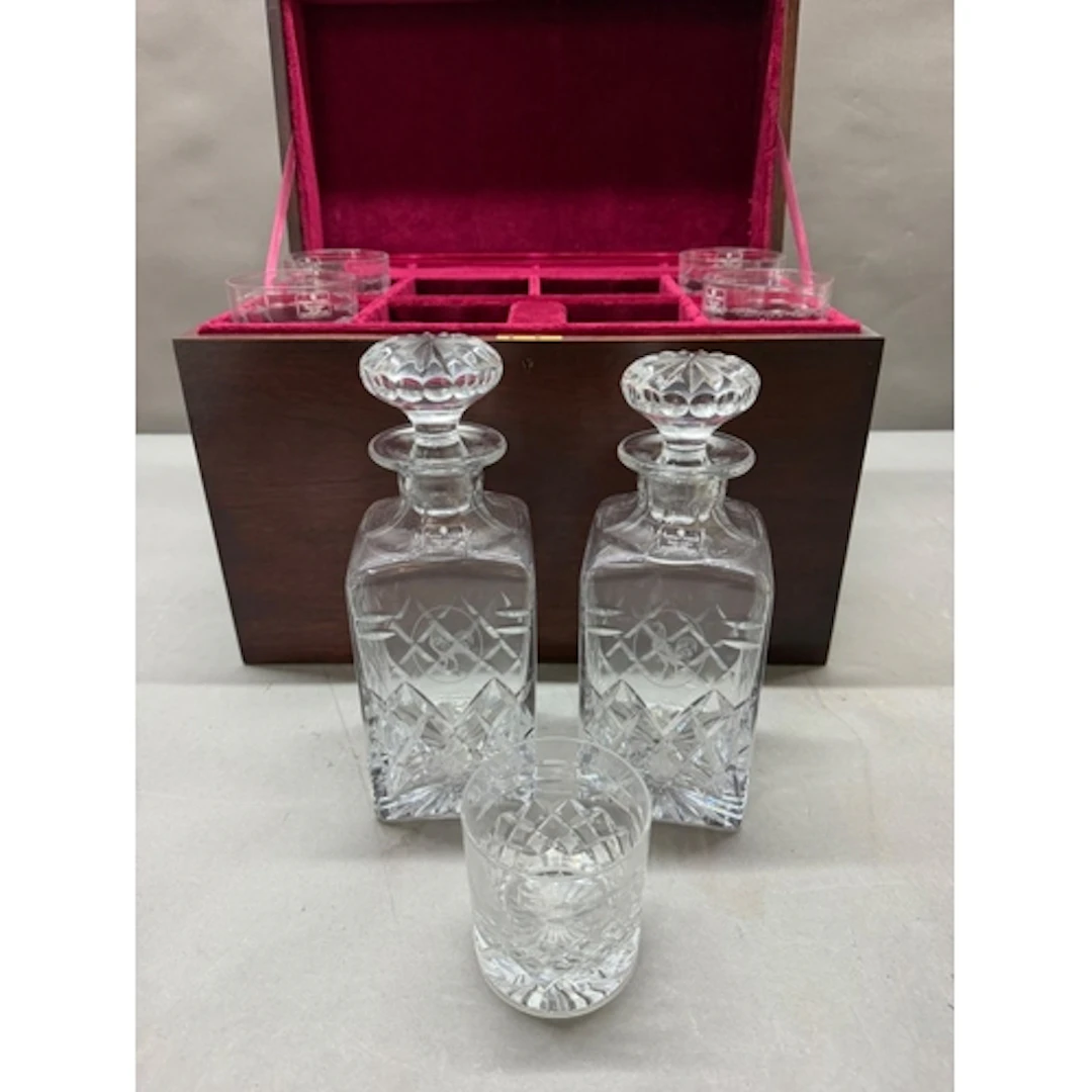 A Mahogany travel cased decanter and tumbler set. The box op...