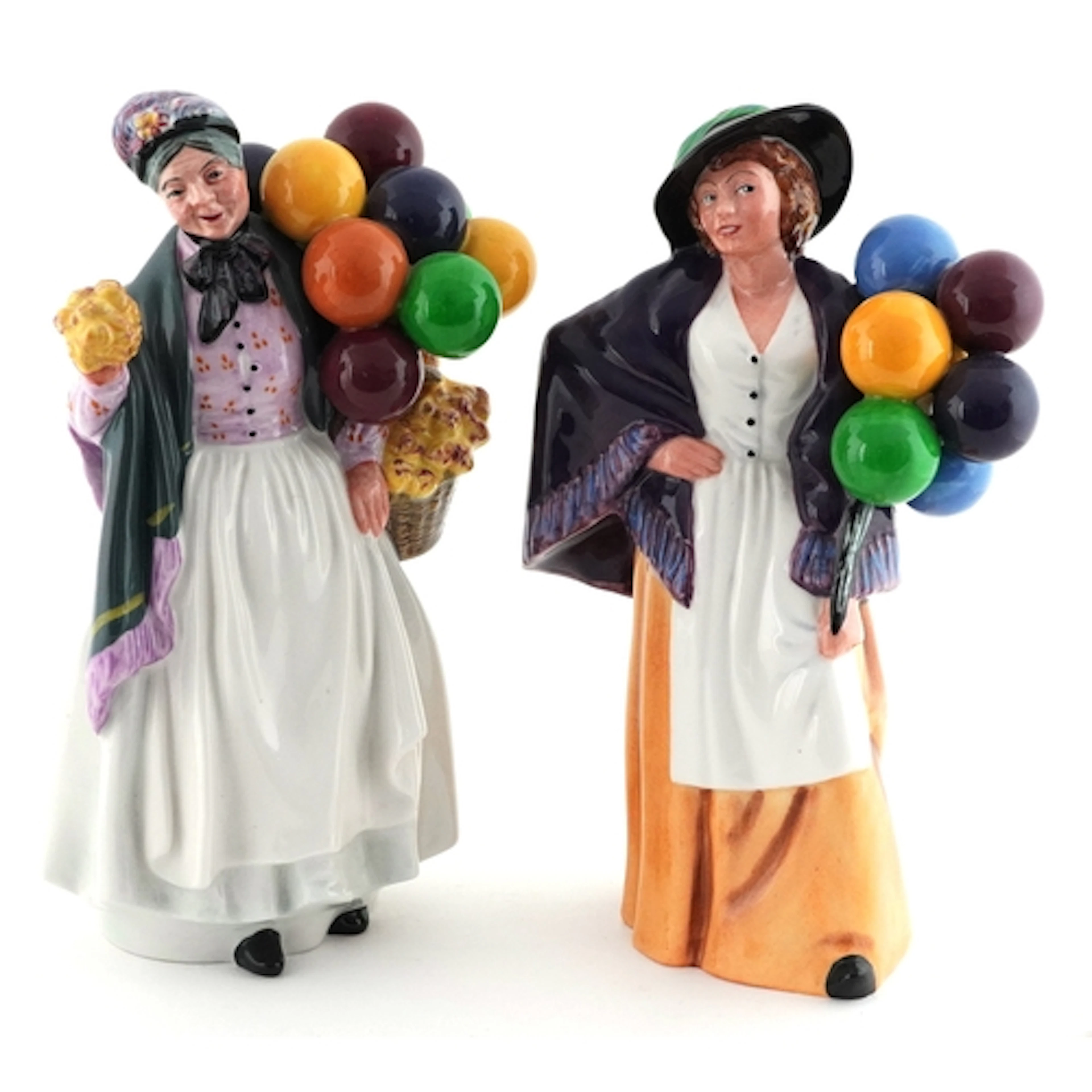 Two Royal Doulton figurines comprising Biddy Penny Farthing ...