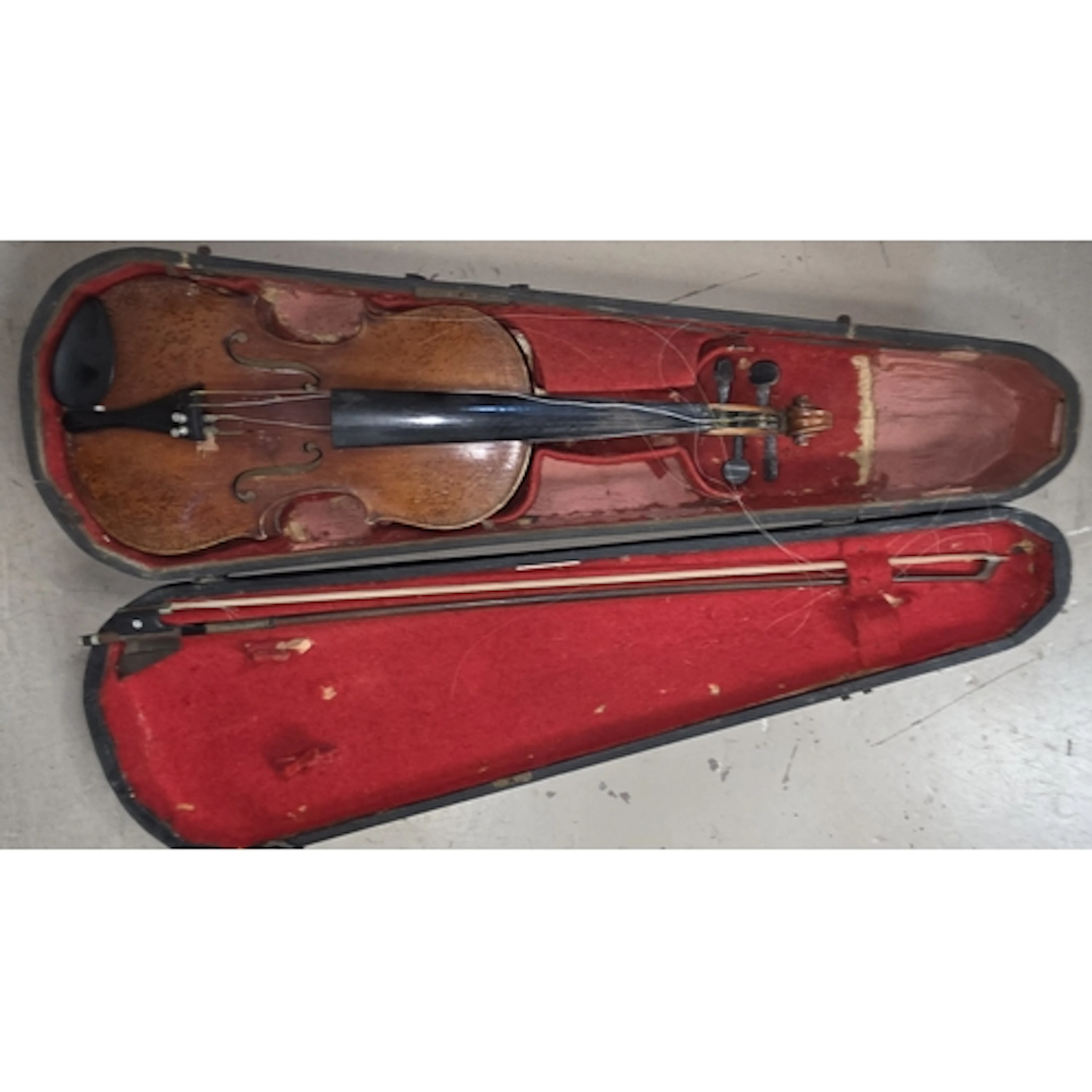 A 19th century two piece back violin with bow and case, full...