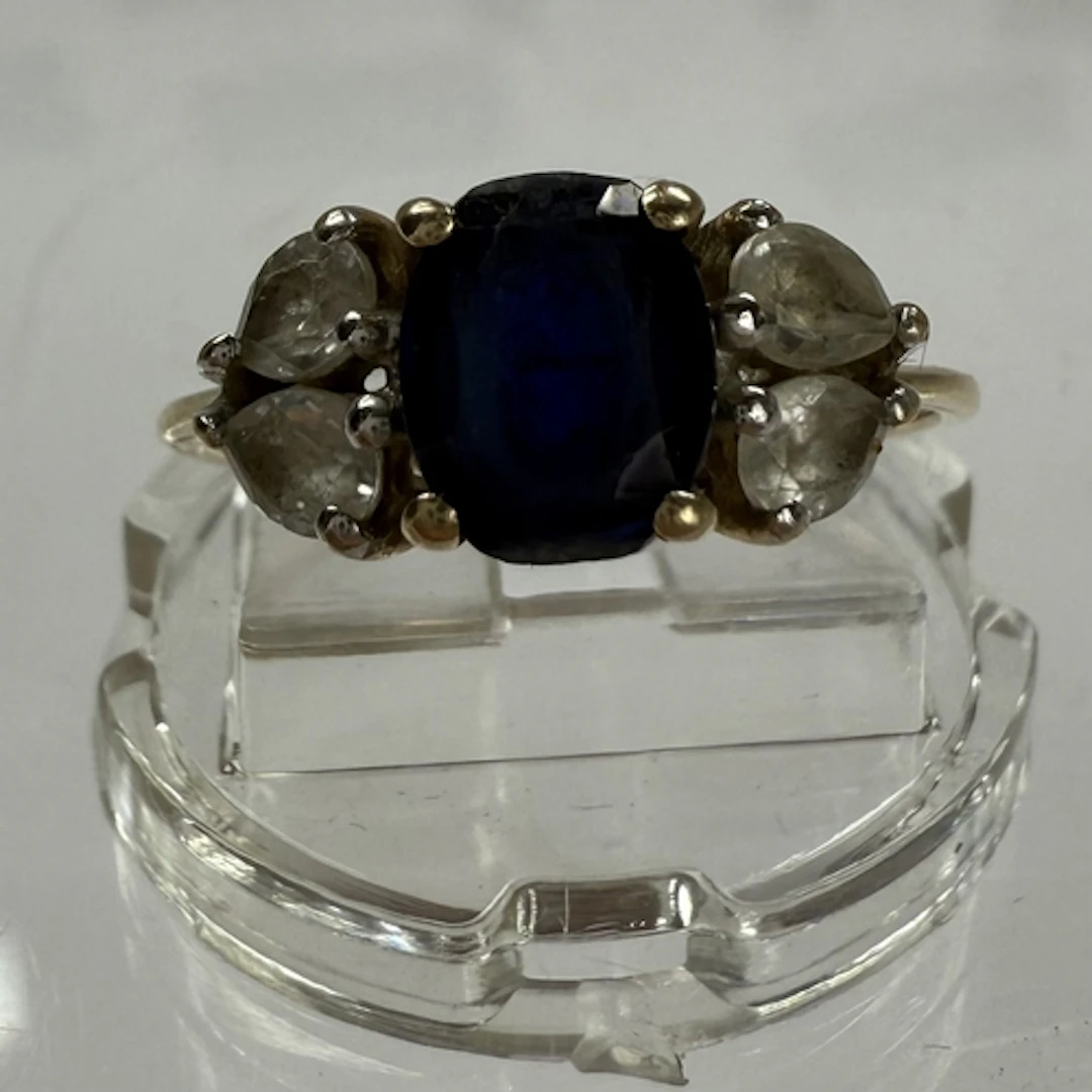 Jewellery: Hallmarked 9ct gold ring set with an oval blue pa...