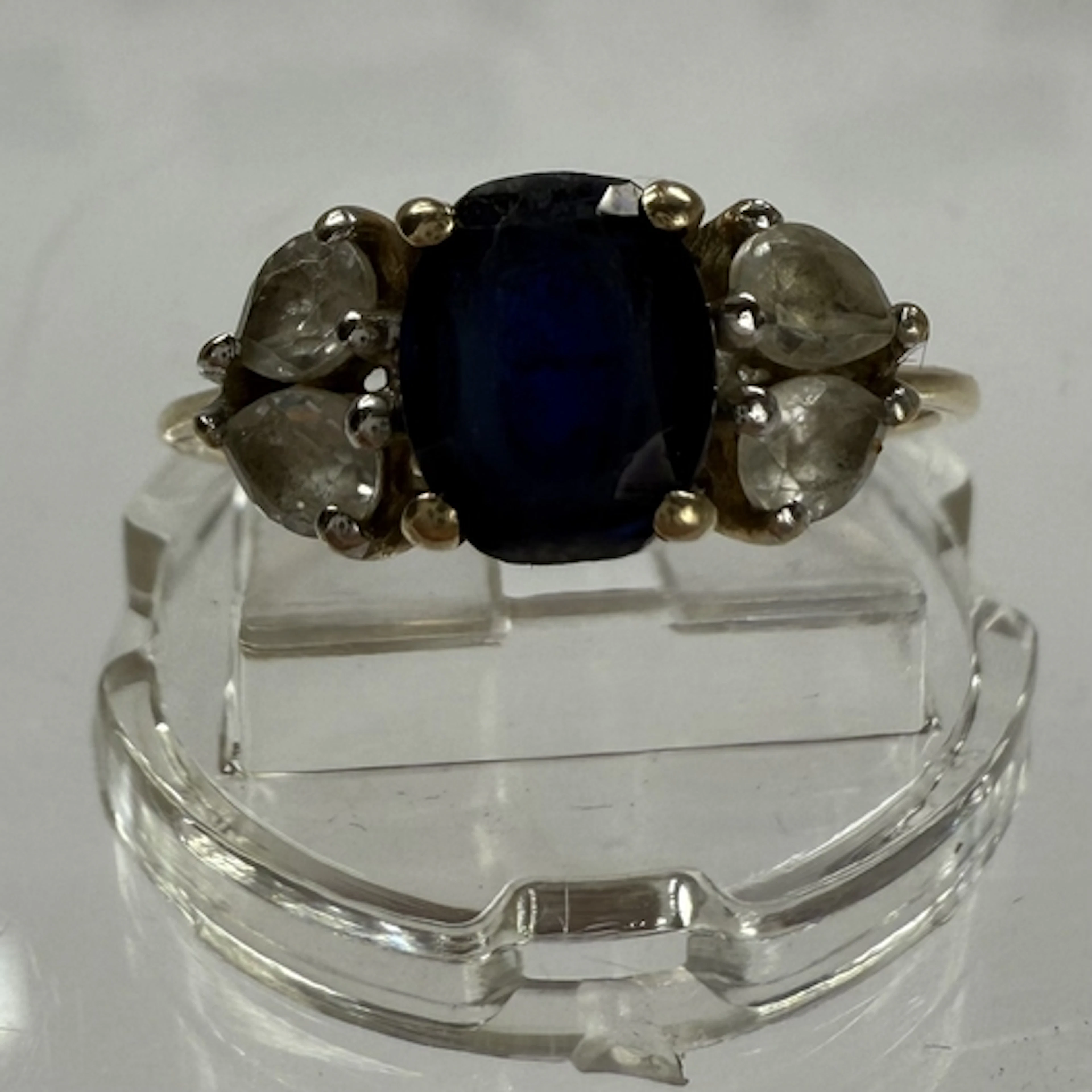 Jewellery: Hallmarked 9ct gold ring set with an oval blue pa...