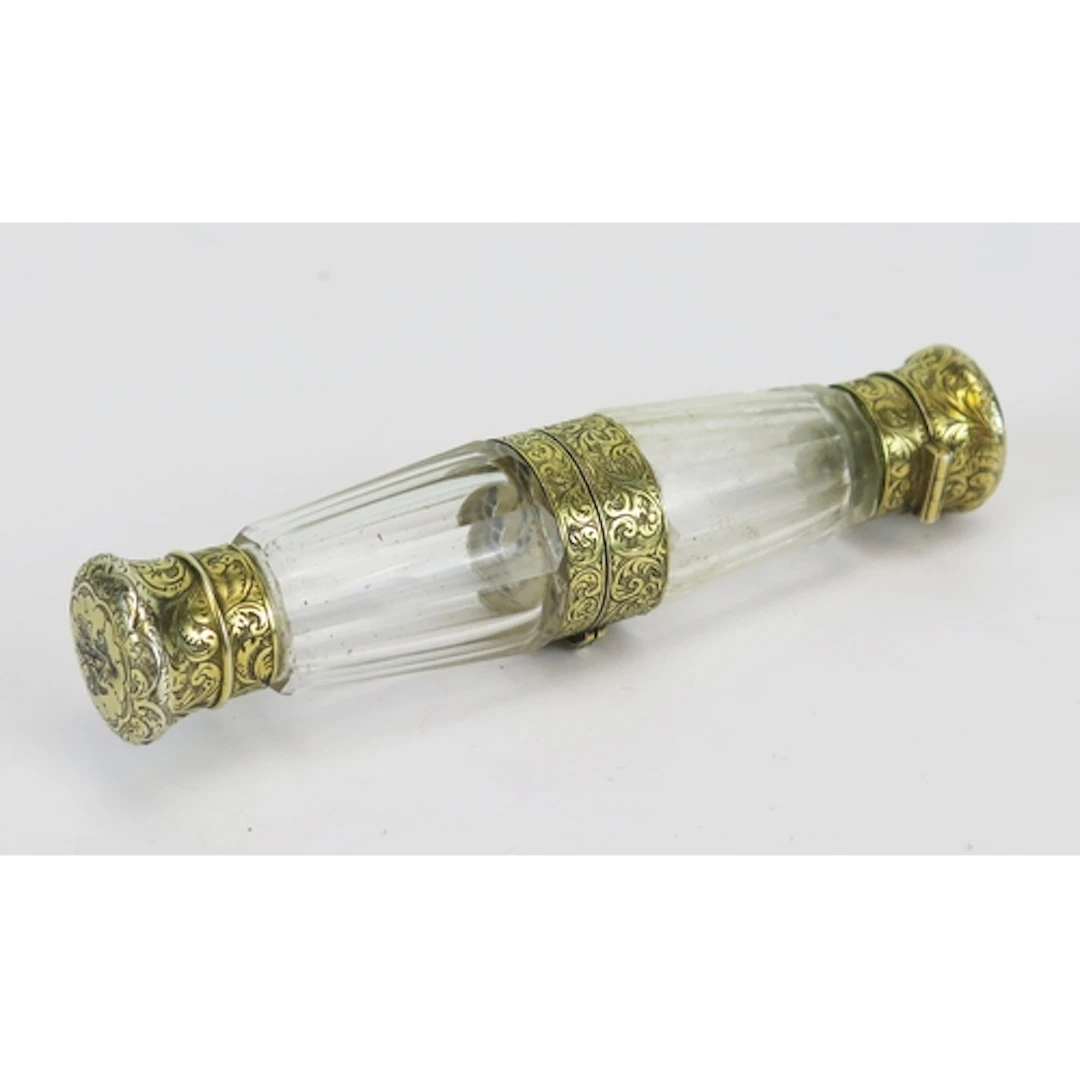 Sampson Mordan & Co. - a double ended hinged glass scent bot...