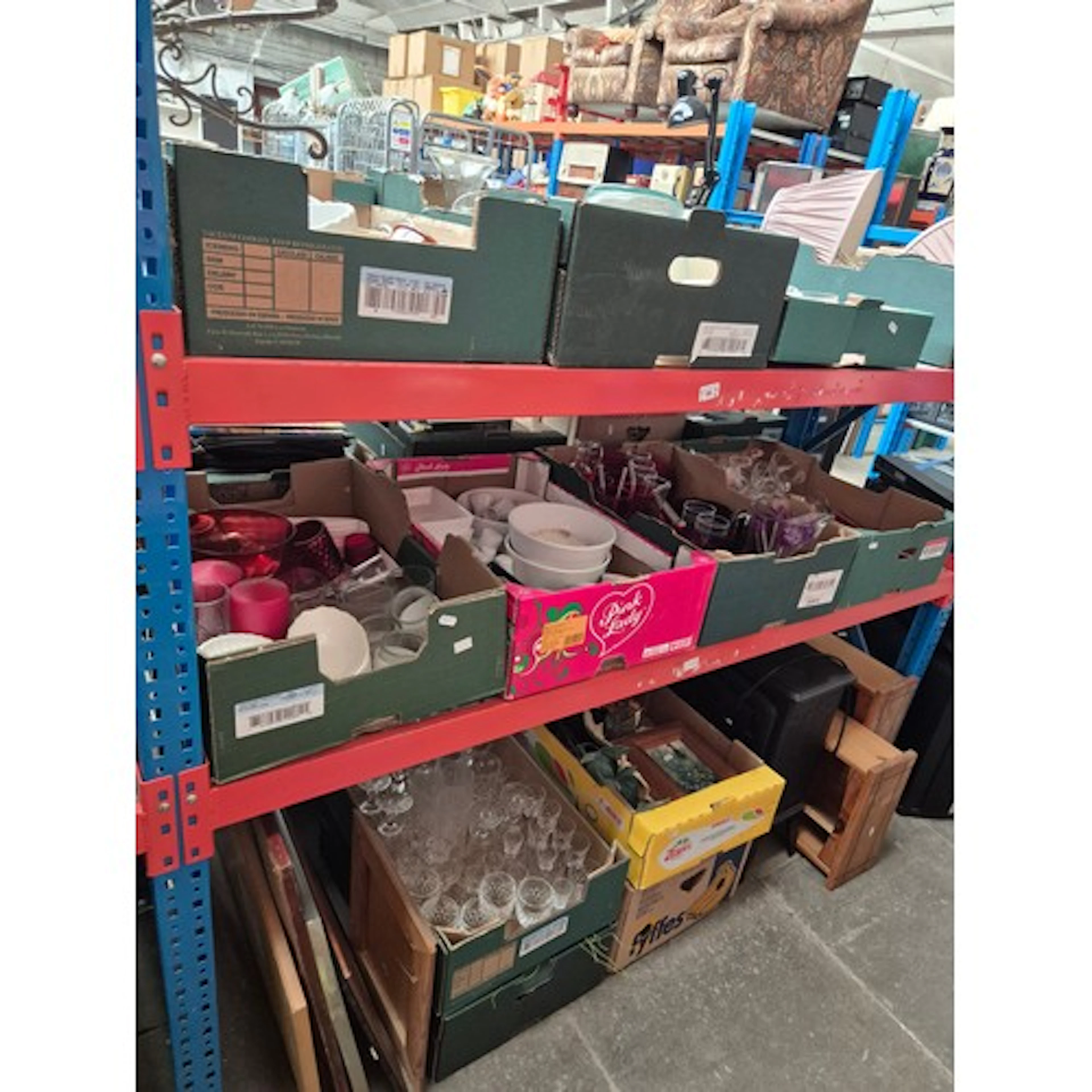 12 boxes of mixed items on 3 shelves, including kitchen ware...