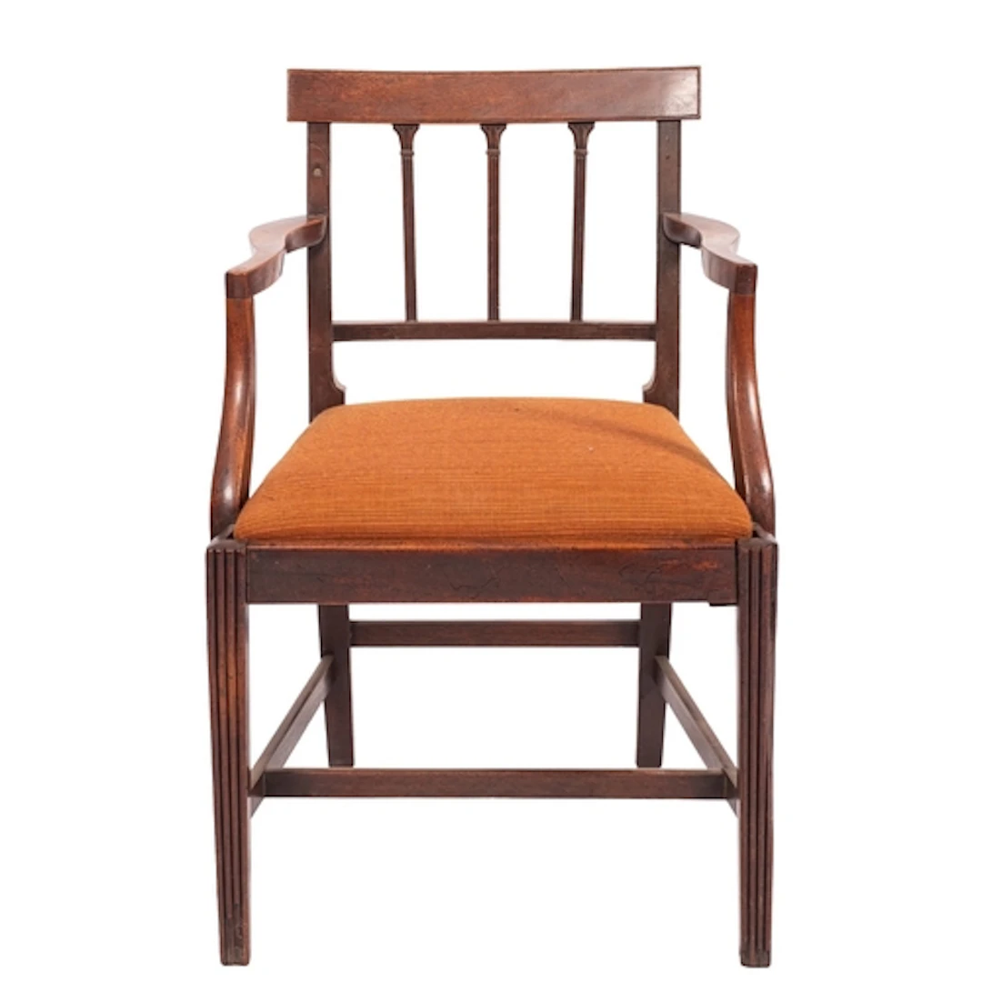 A Regency mahogany commode elbow chair, early 19th century; ...