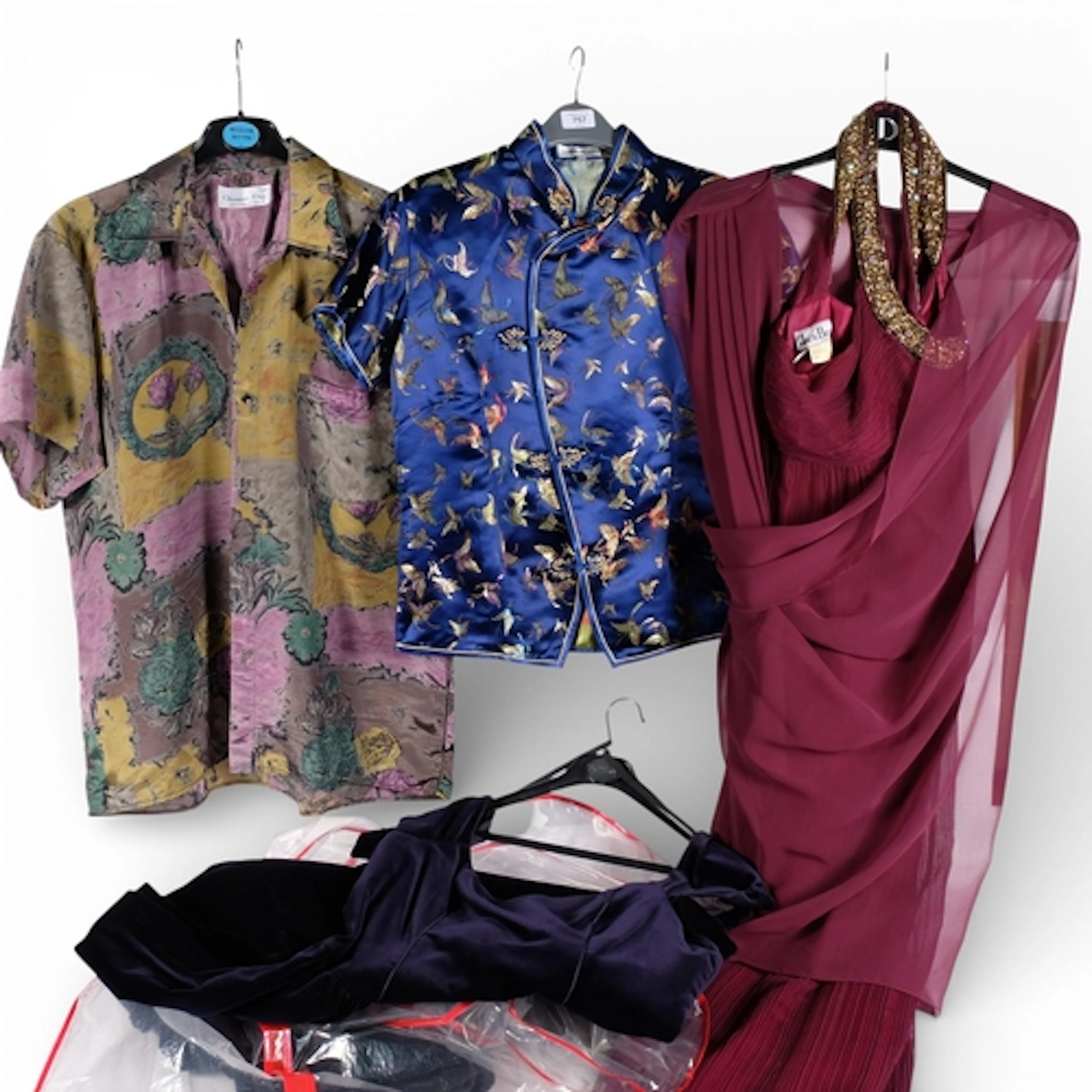 A collection of lady's clothing, including a Chinese blue an...