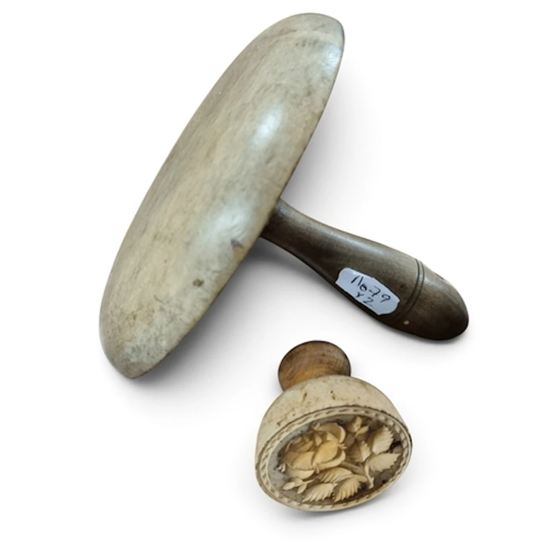 A 19th Century Treen Butter Stamp and an antique primative T...