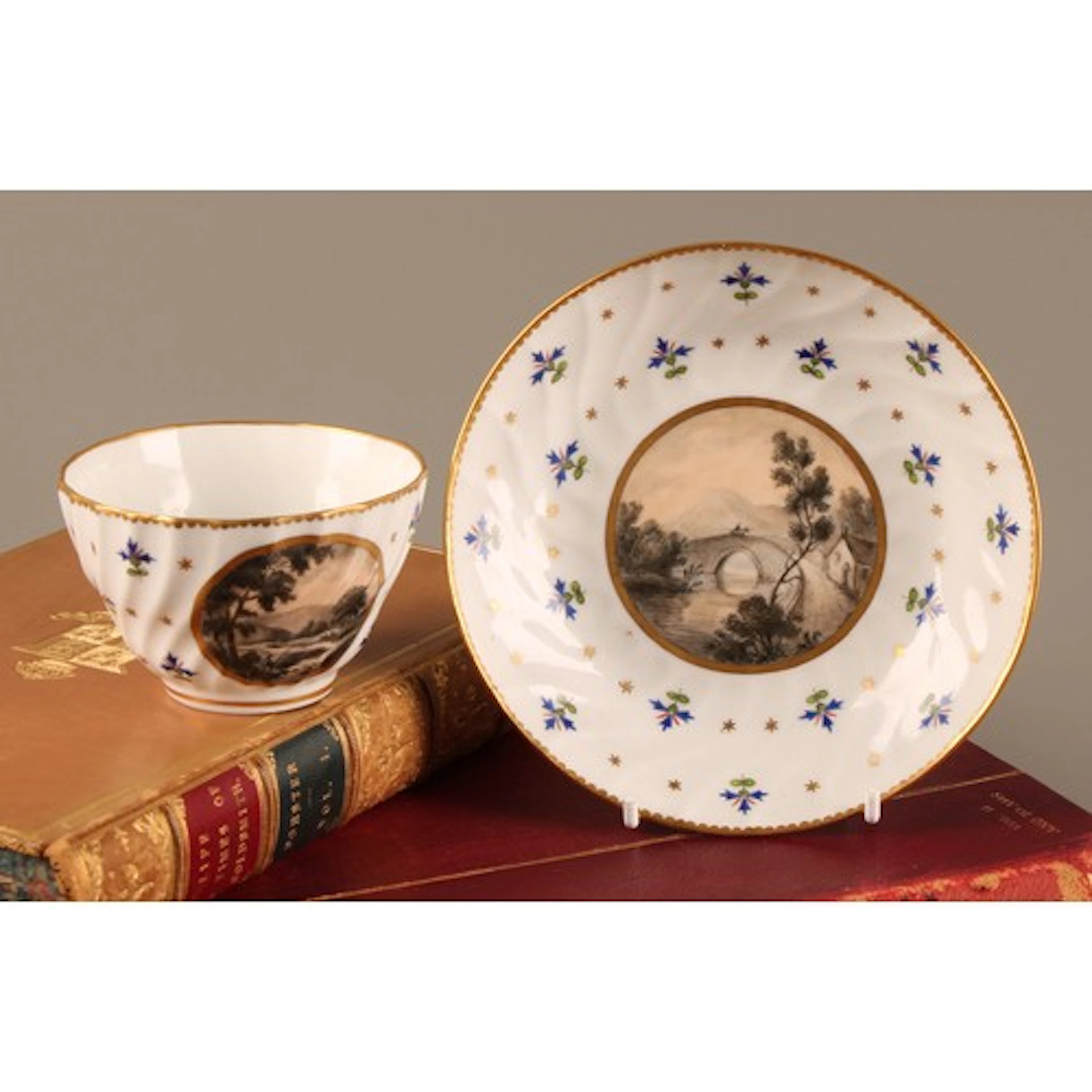 A Flight and Barr Worcester tea bowl and saucer, wrythen mou...