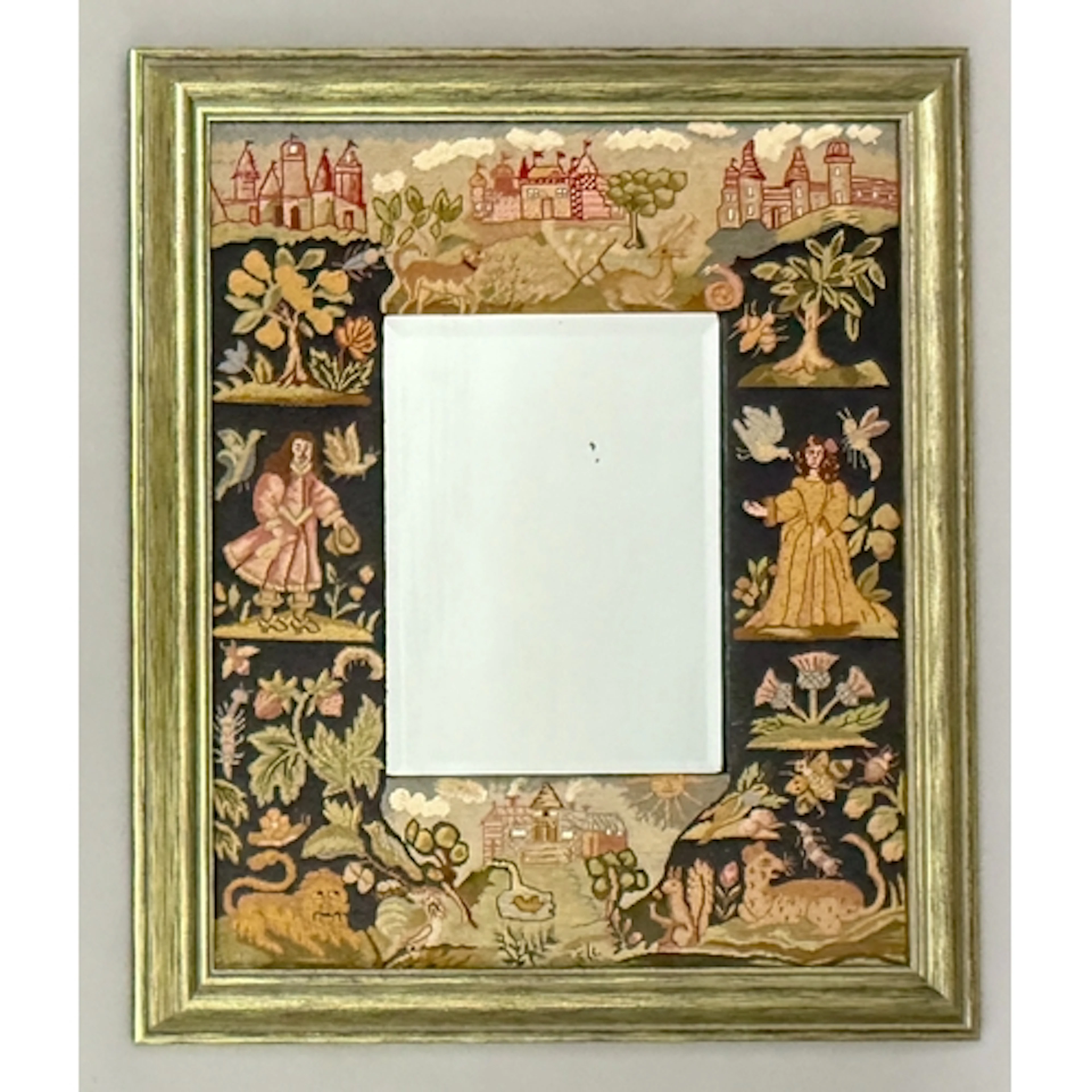 An antique style petit point framed mirror - in the 17th cen...