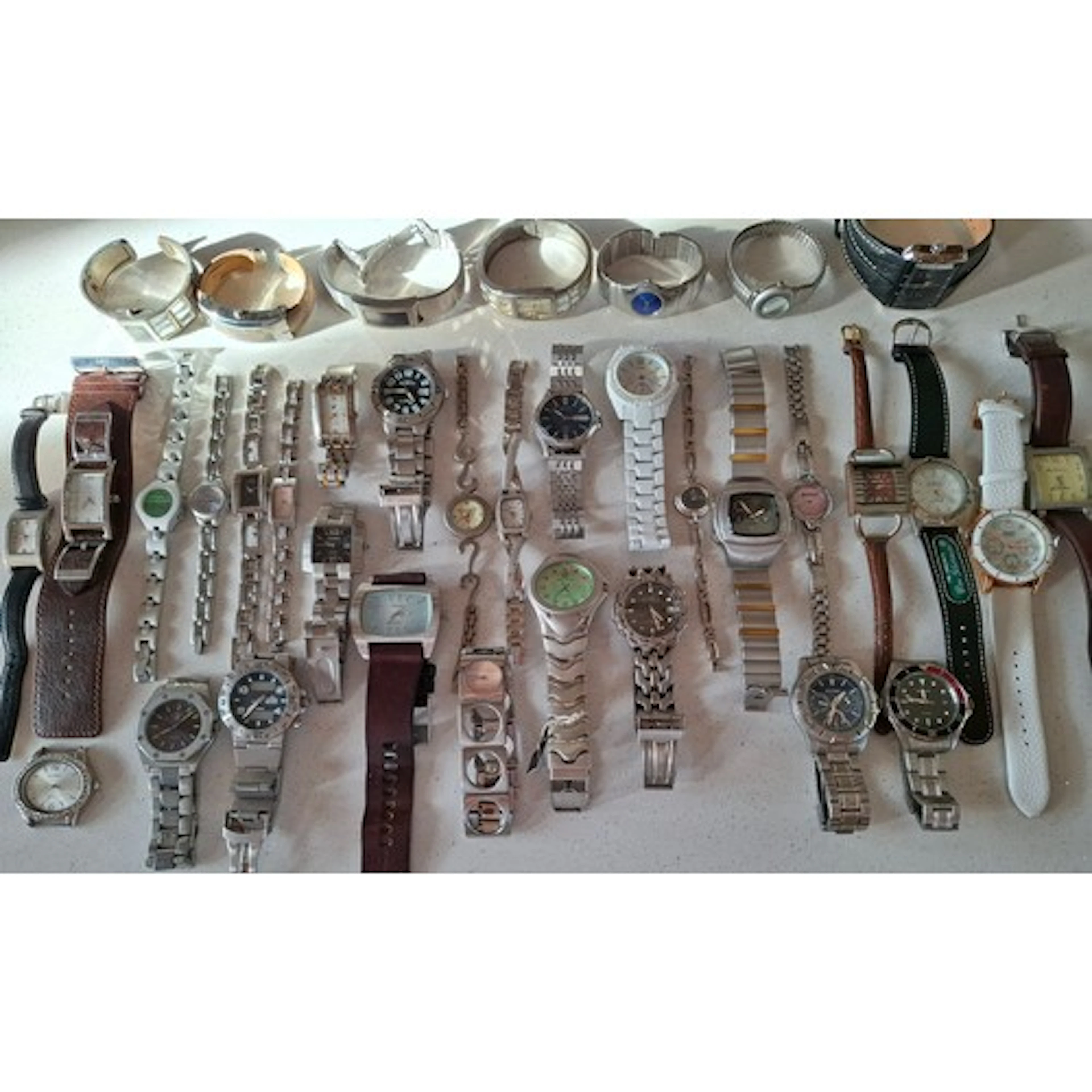 A quantity of fashion watches to include DKNY, Guess, Fossil...
