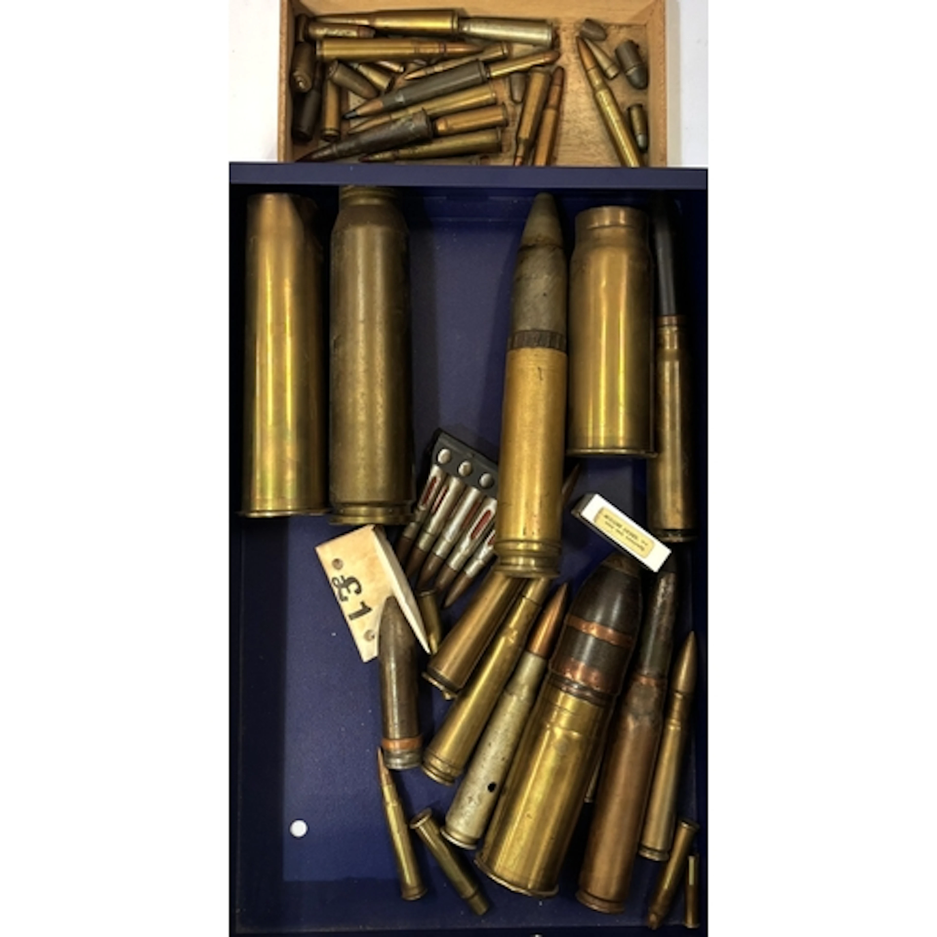 A collection of various shell cases, shell noses, bullets et...