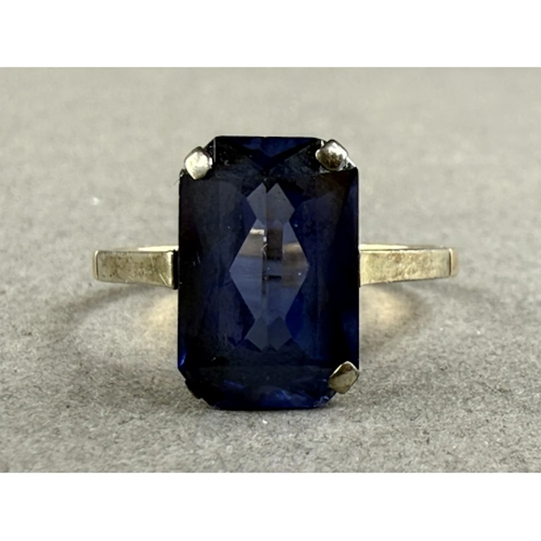 Jewellery: an early 20th century 9ct yellow gold ring set a ...
