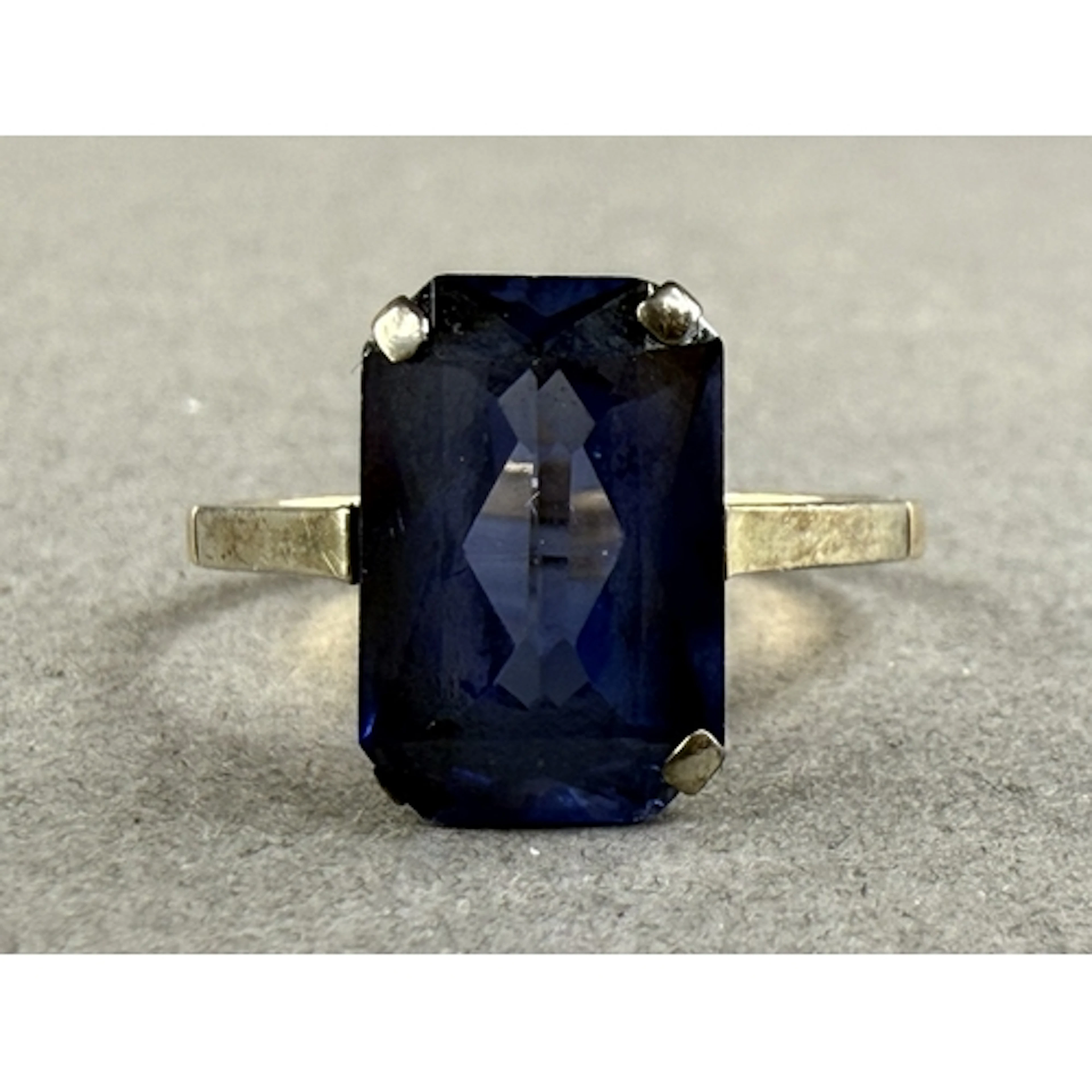 Jewellery: an early 20th century 9ct yellow gold ring set a ...