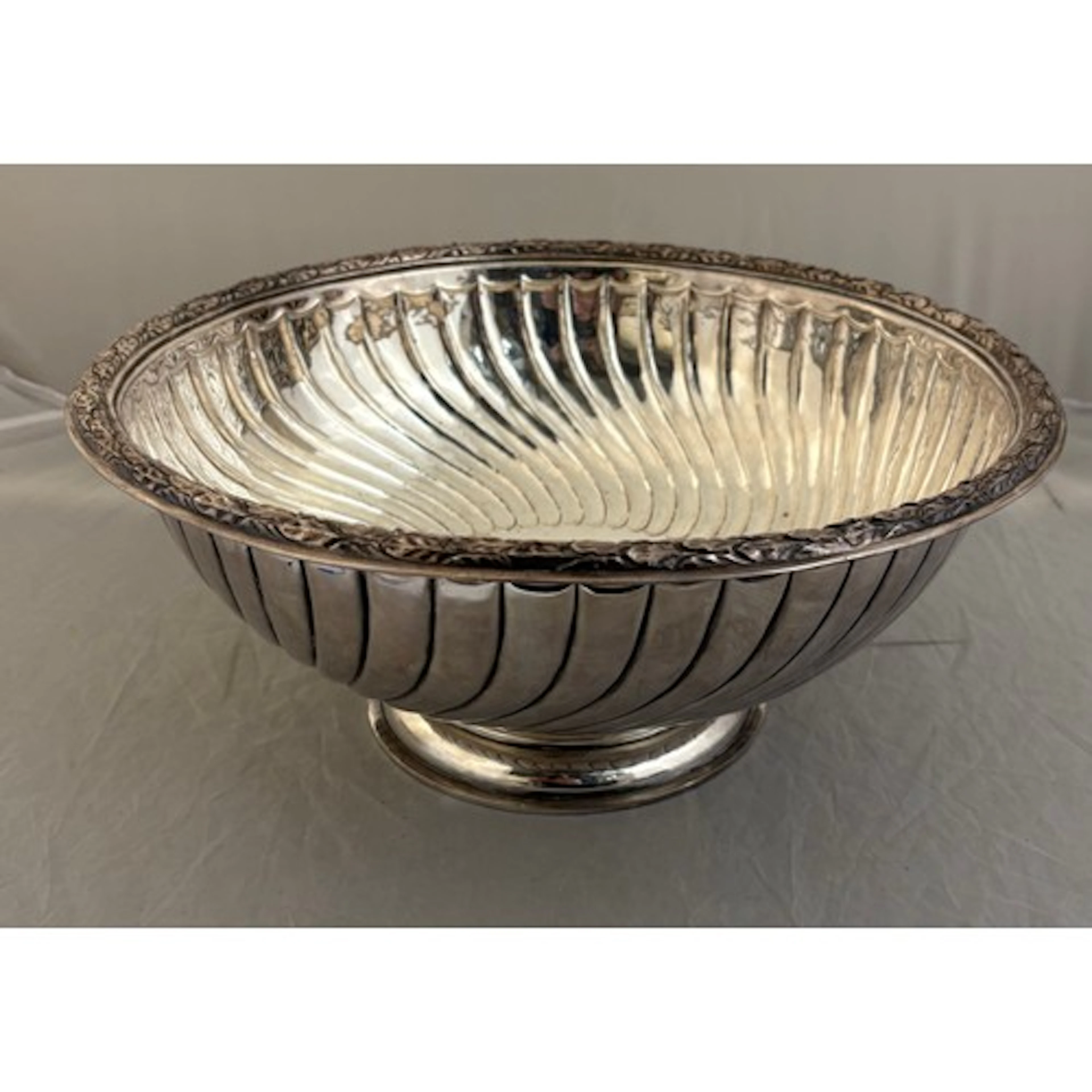 A large silver plated punch bowl 33cm diameter