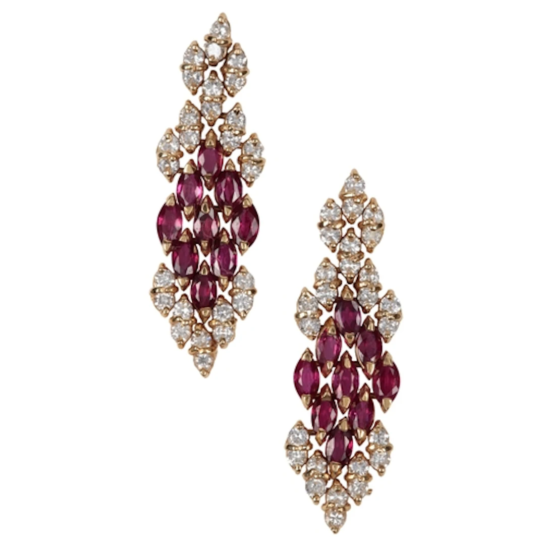 A pair of gold, ruby and diamond earrings, each designed as ...