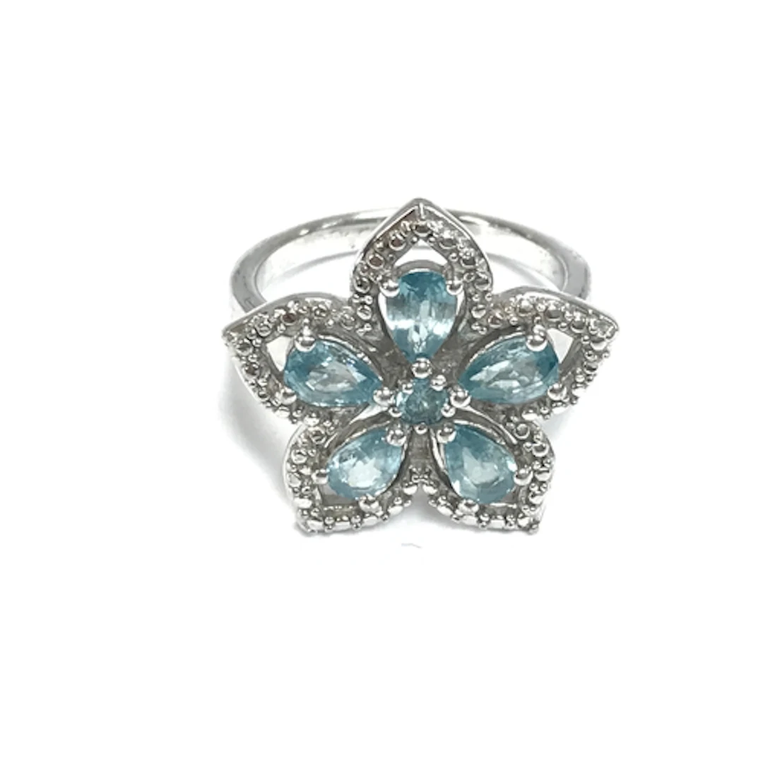 Gold plated silver floral-cluster ring set with blue an...