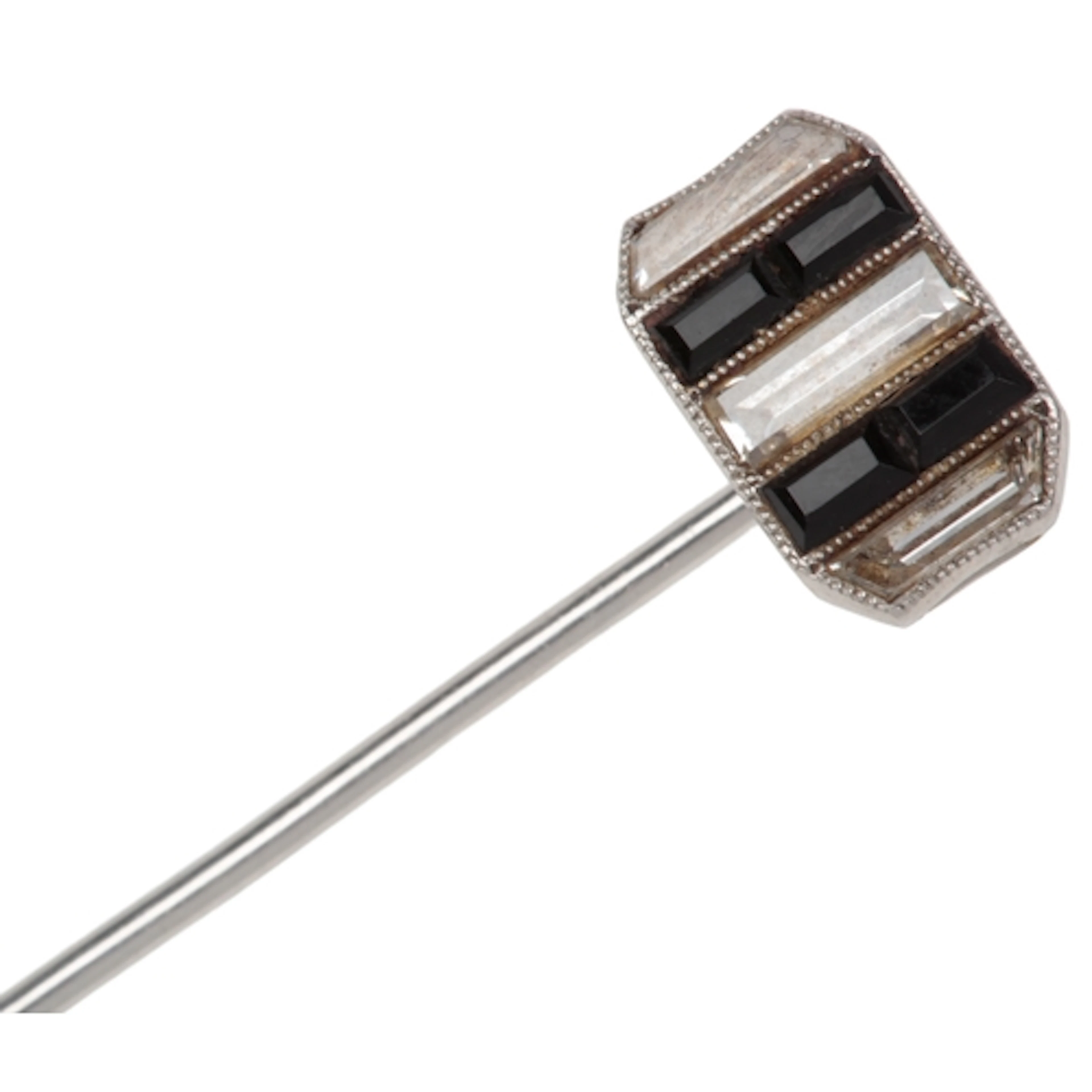 An Art Deco sapphire and diamond stick pin, 1920s, set with ...