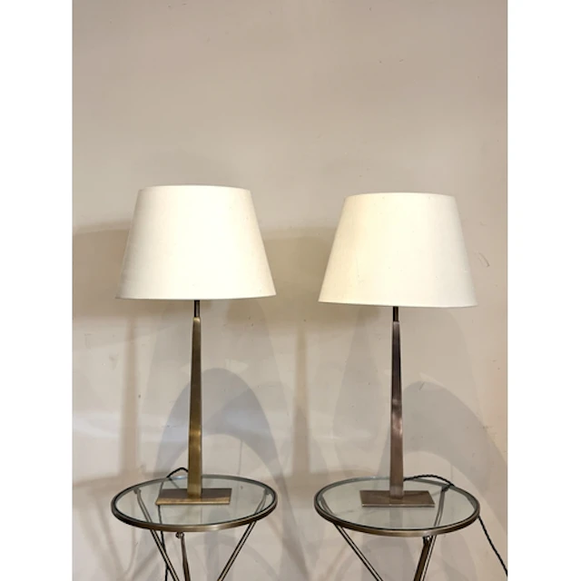 A pair of brushed metal Pooky Trafalgar table lamps, each wi...