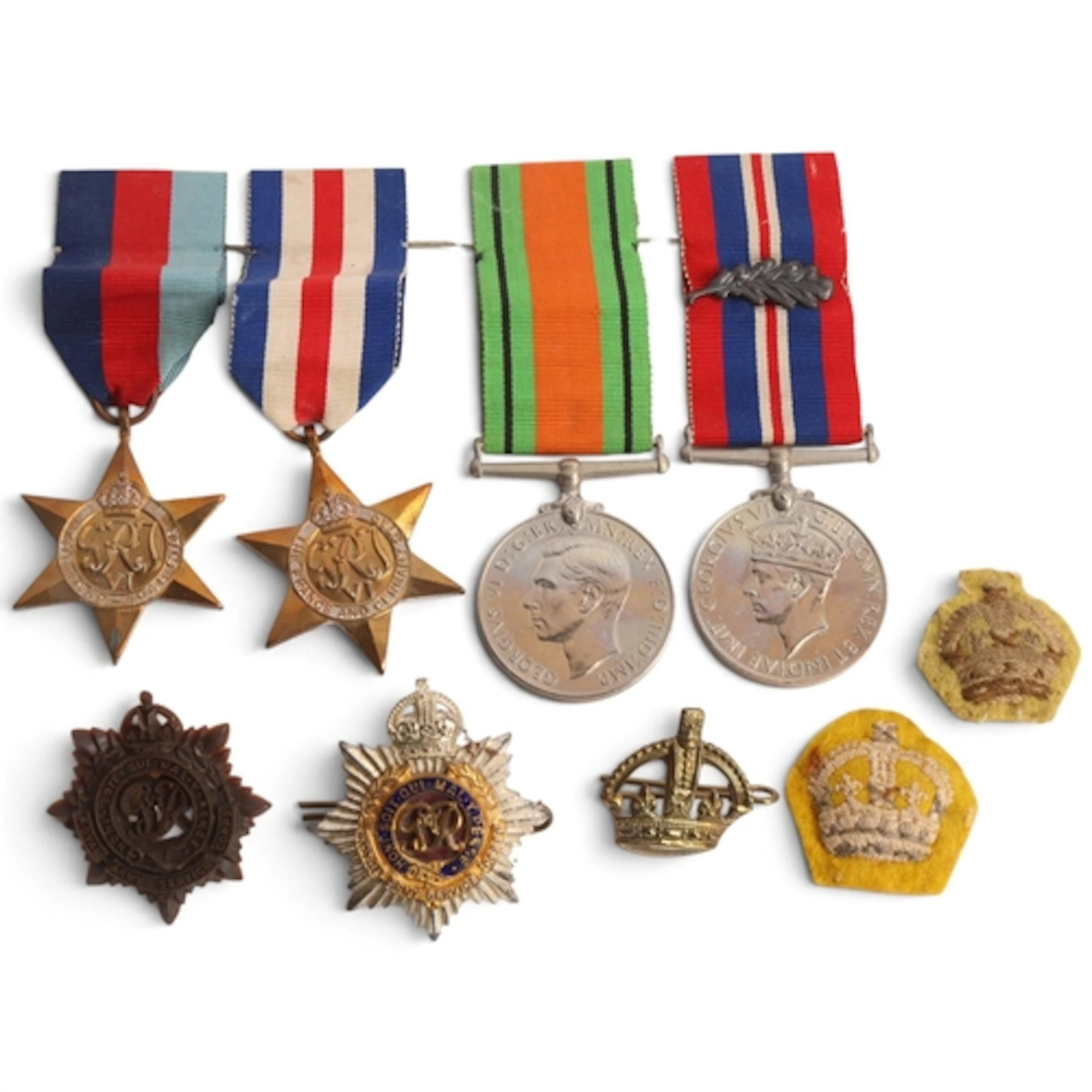 A World War II medal group including oak leaf for mention in...