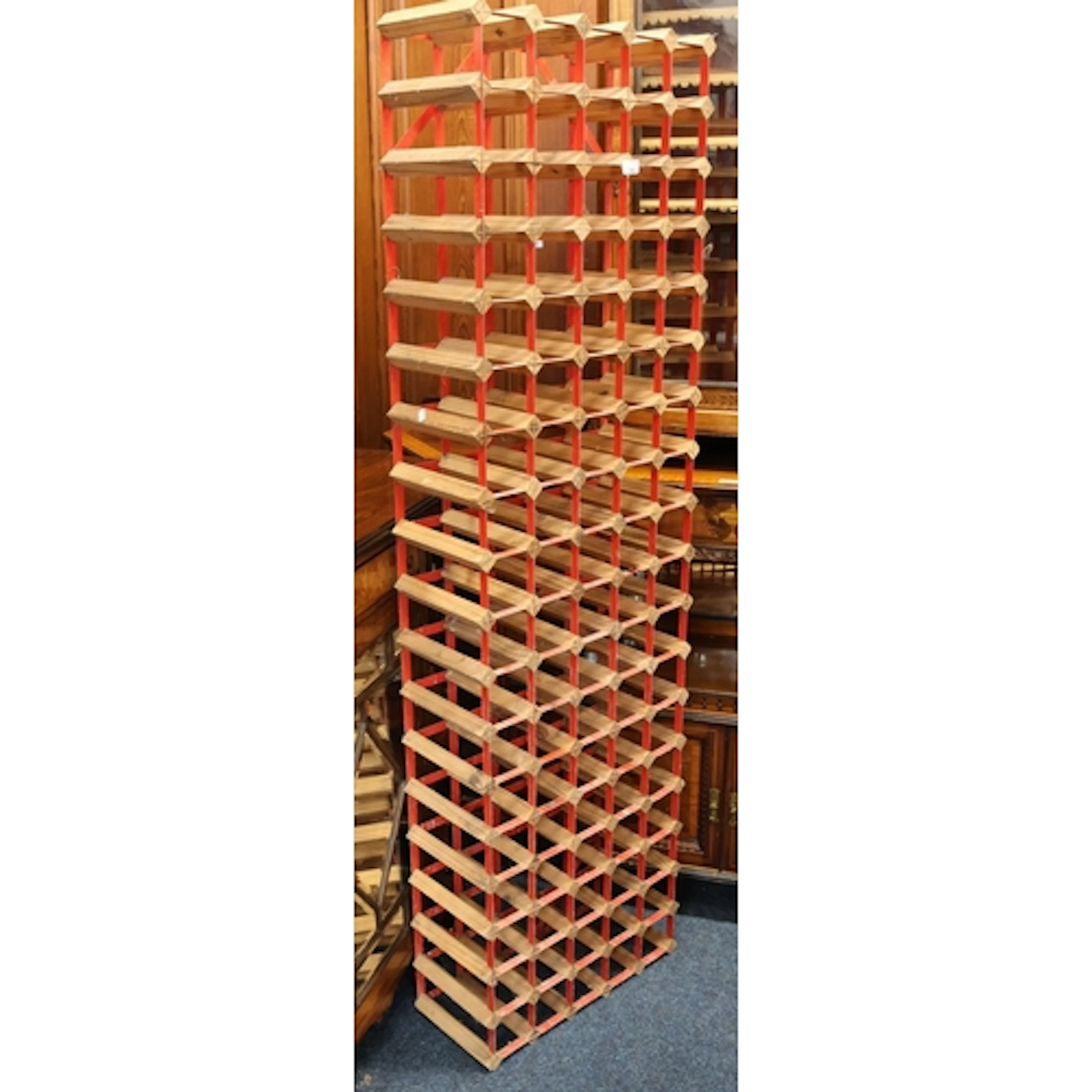 Floor standing metal wine rack.