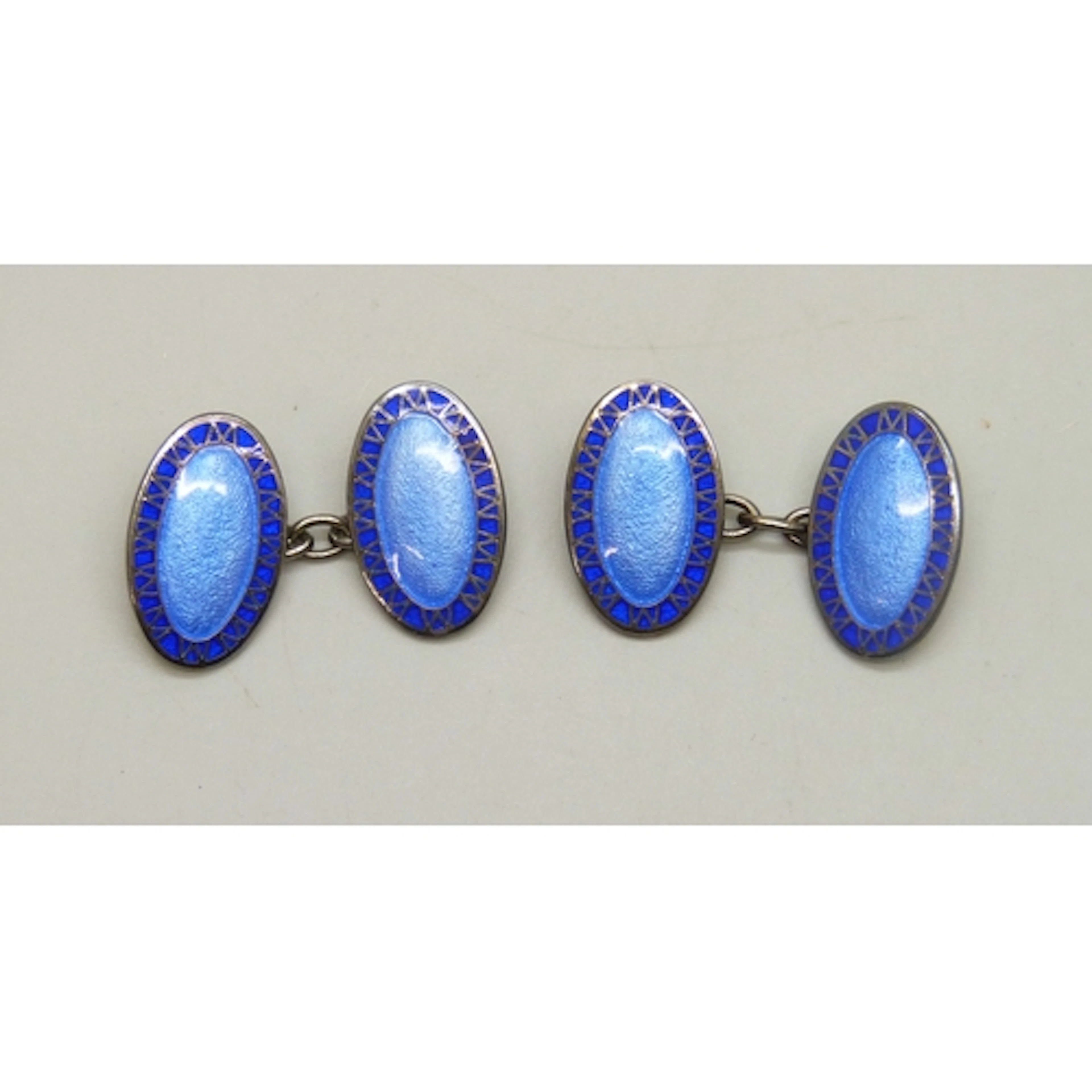 A pair of Mappin & Webb silver and guilloche enamel cufflink...