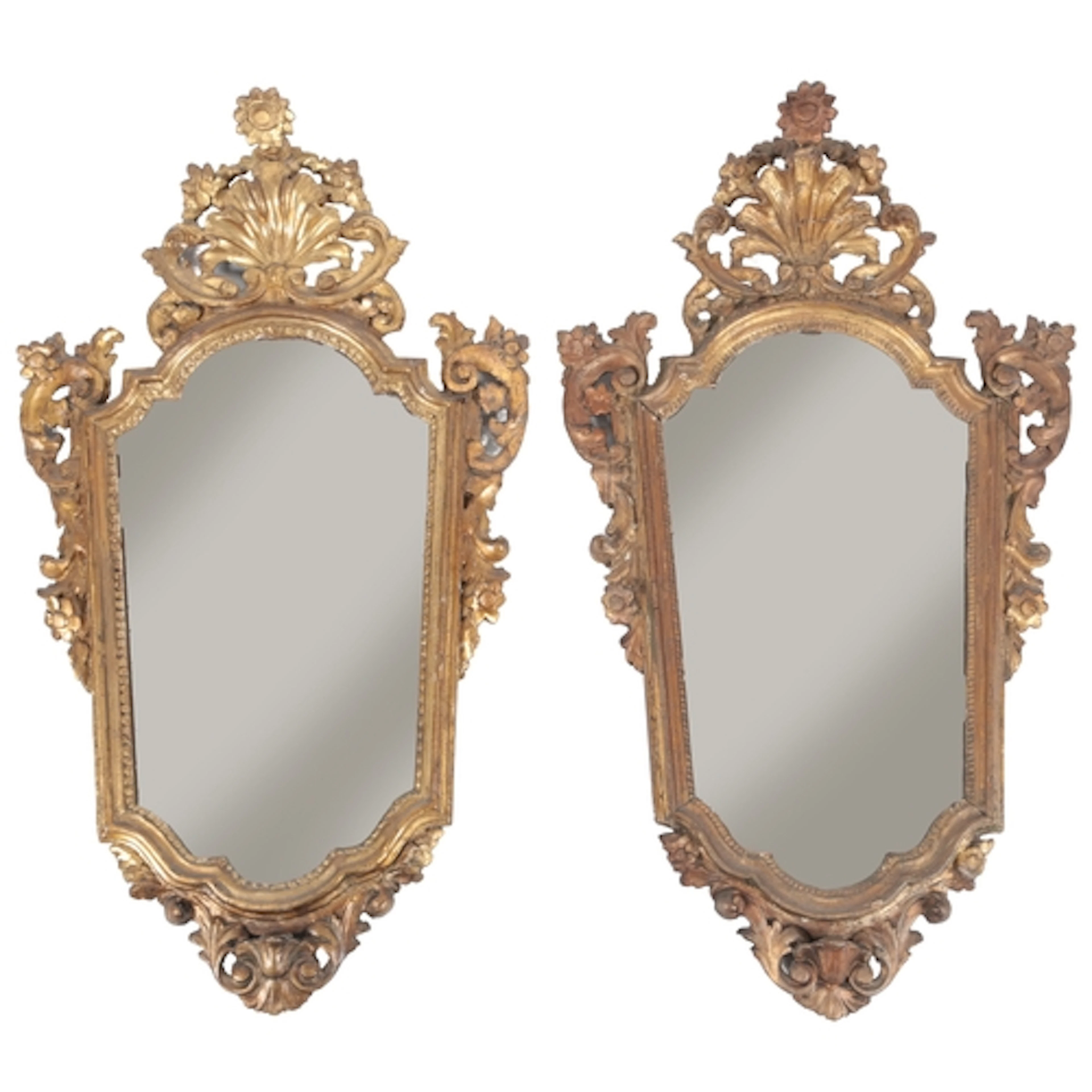A pair of Italian giltwood cartouche shaped wall mirrors, 18...
