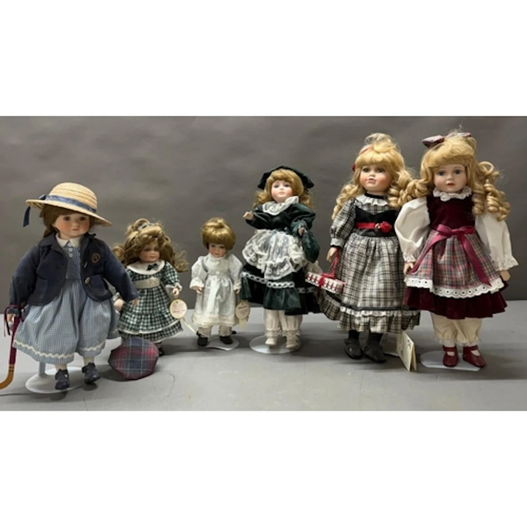 A selection of Alberto's dolls on plinths.