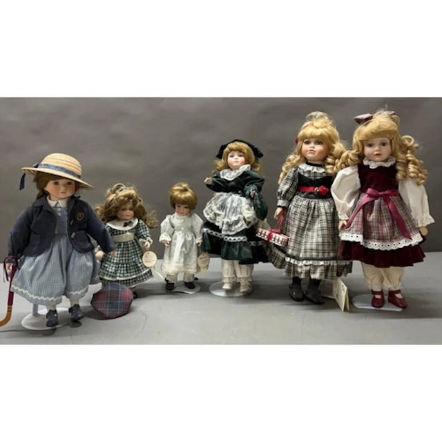 A selection of Alberto's dolls on plinths.