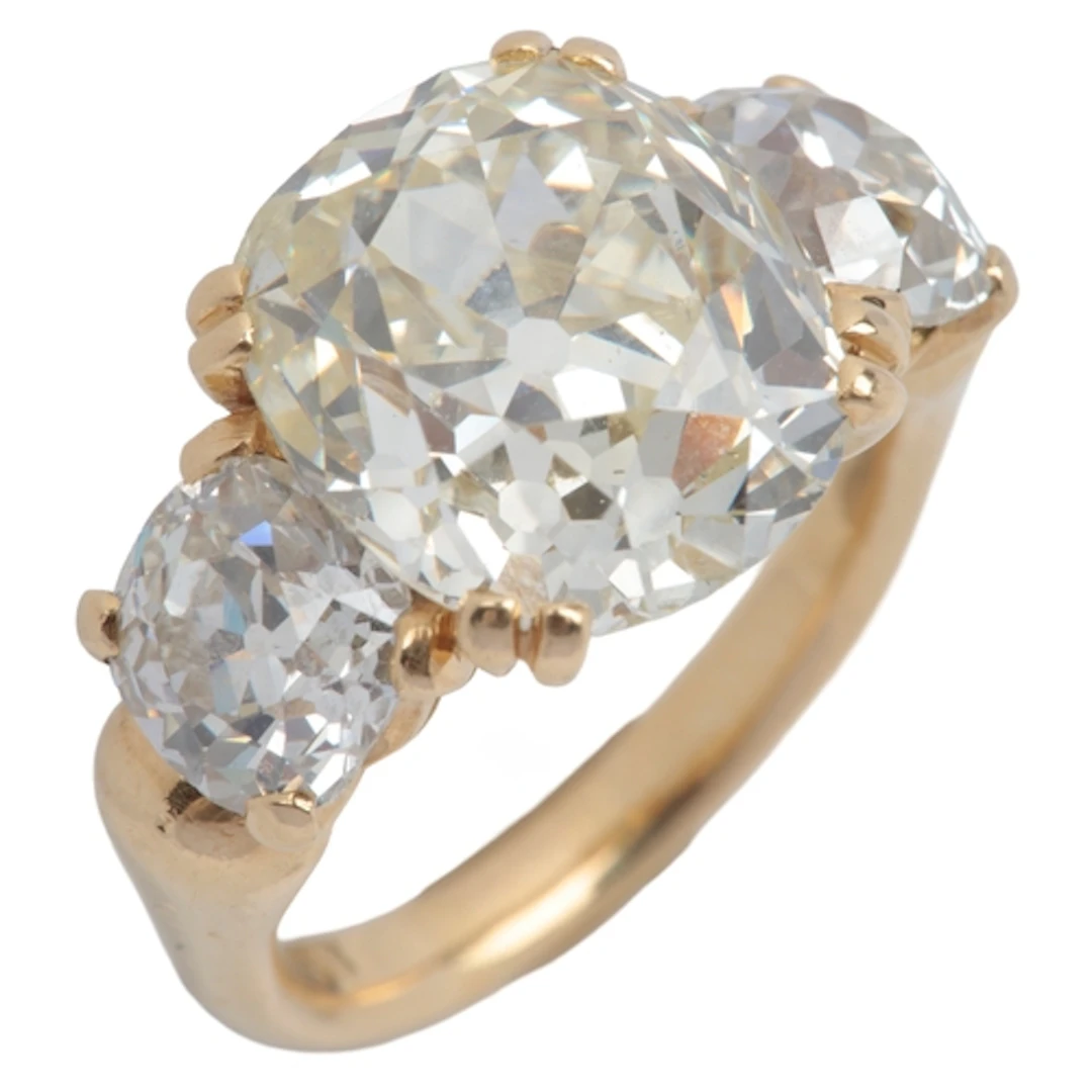 An important diamond ring, claw-set with an antique cushion-...