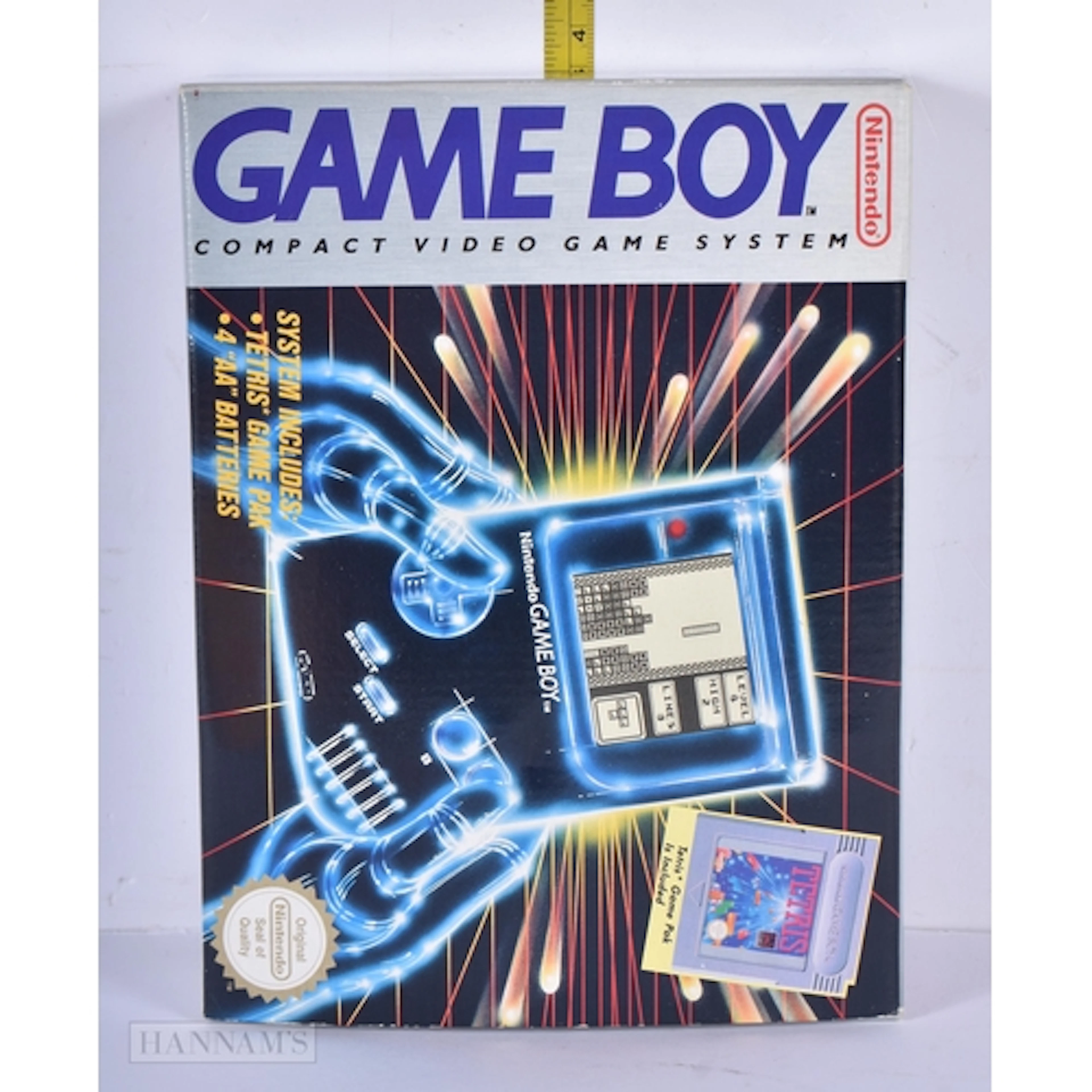 A Nintendo Game Boy console with Tetris and two other games