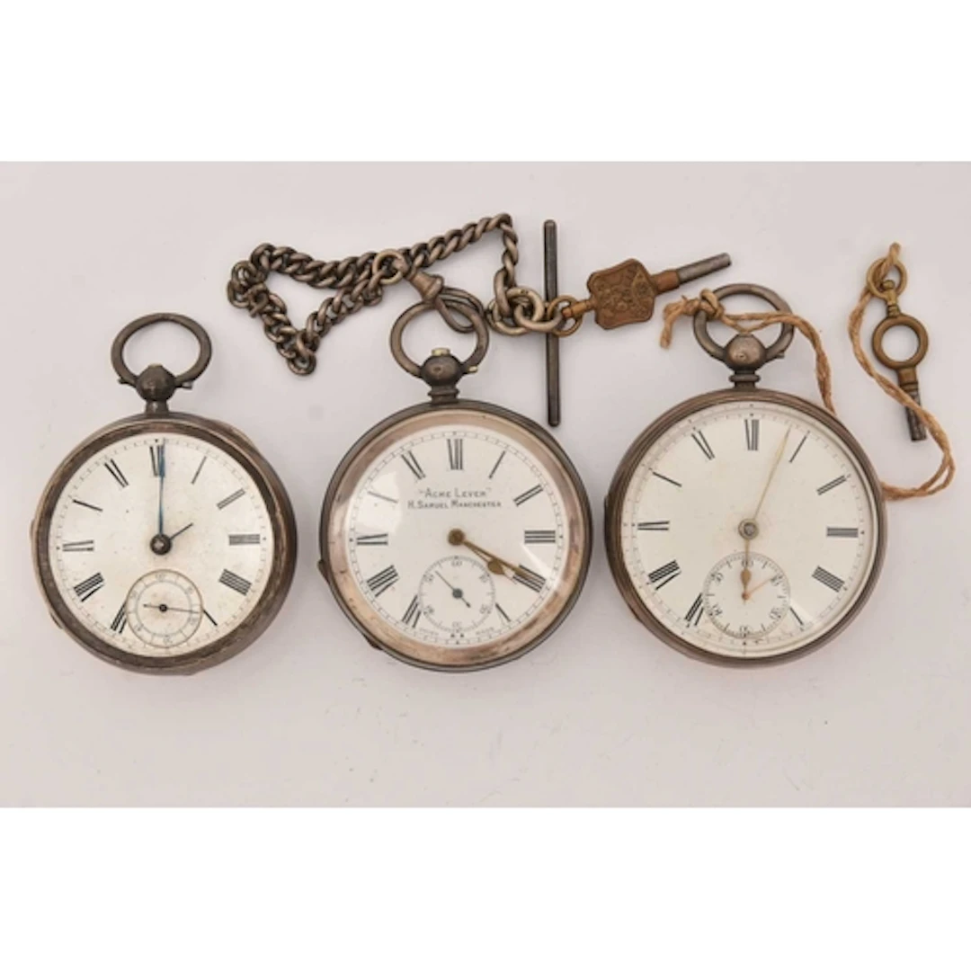 THREE SILVER OPEN FACE POCKET WATCHES, the first a key wound...