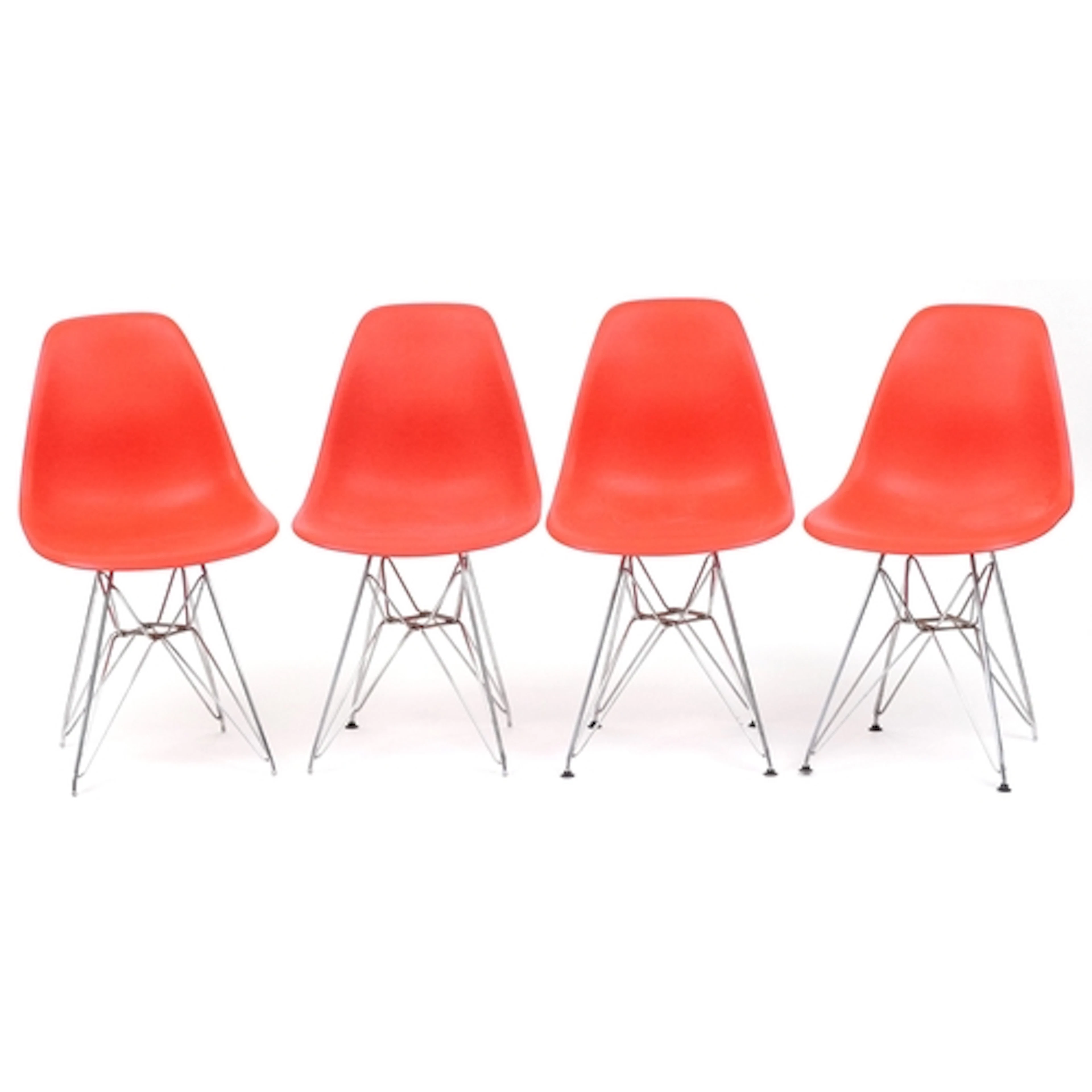 Set of four Vitra Eames style Eiffel Tower design red plasti...