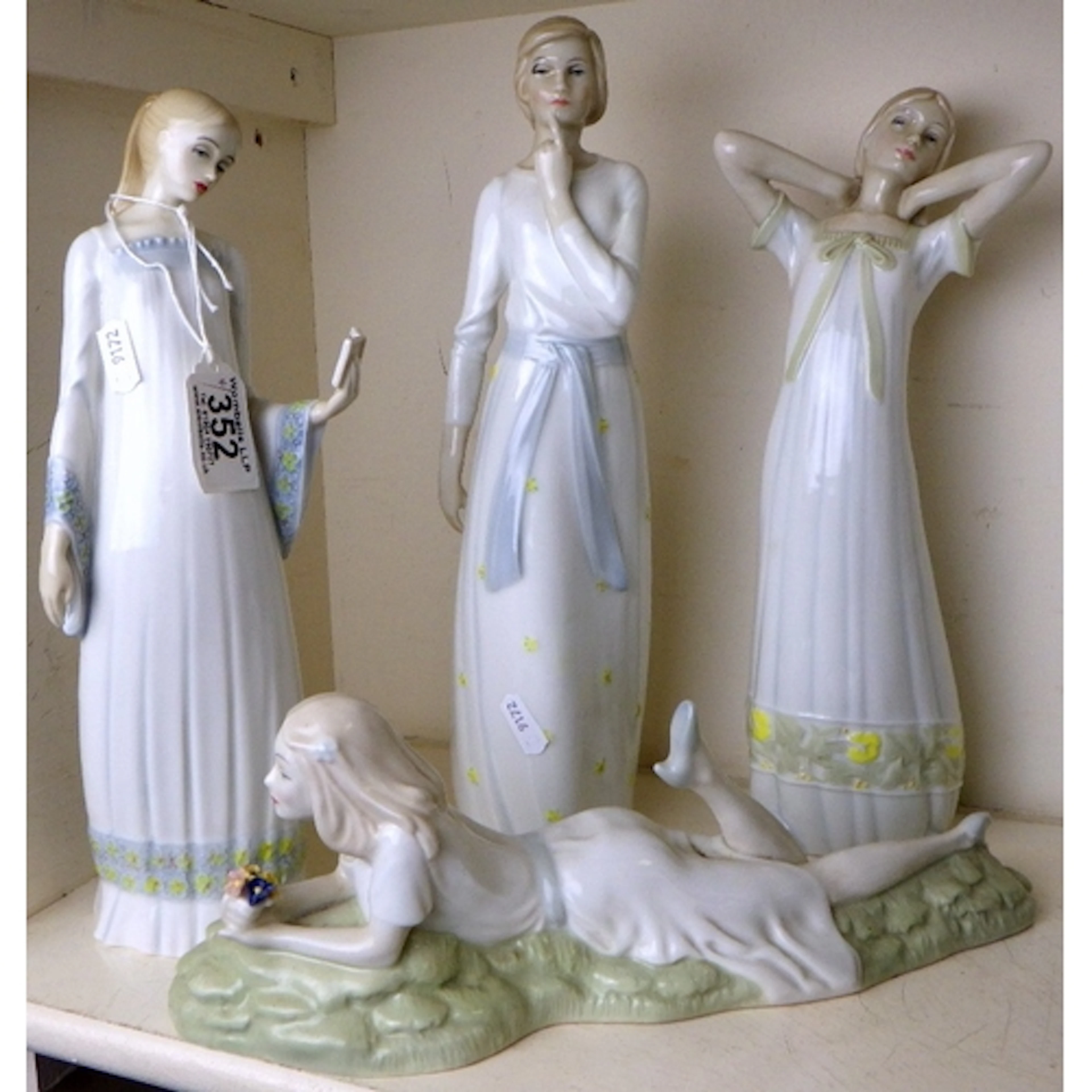 A group of Royal Doulton figurines