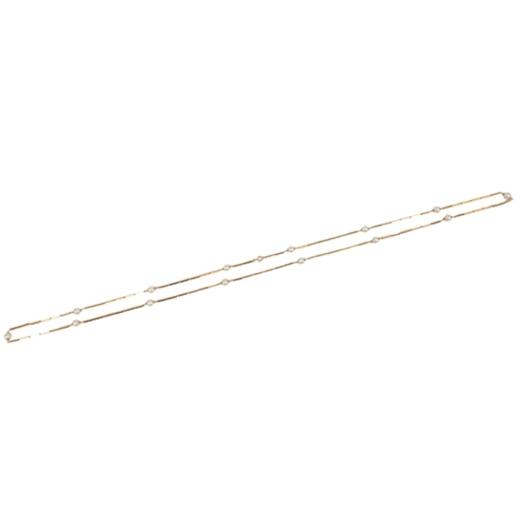 A gold and untested pearl longchain, mid 20th century, compo...