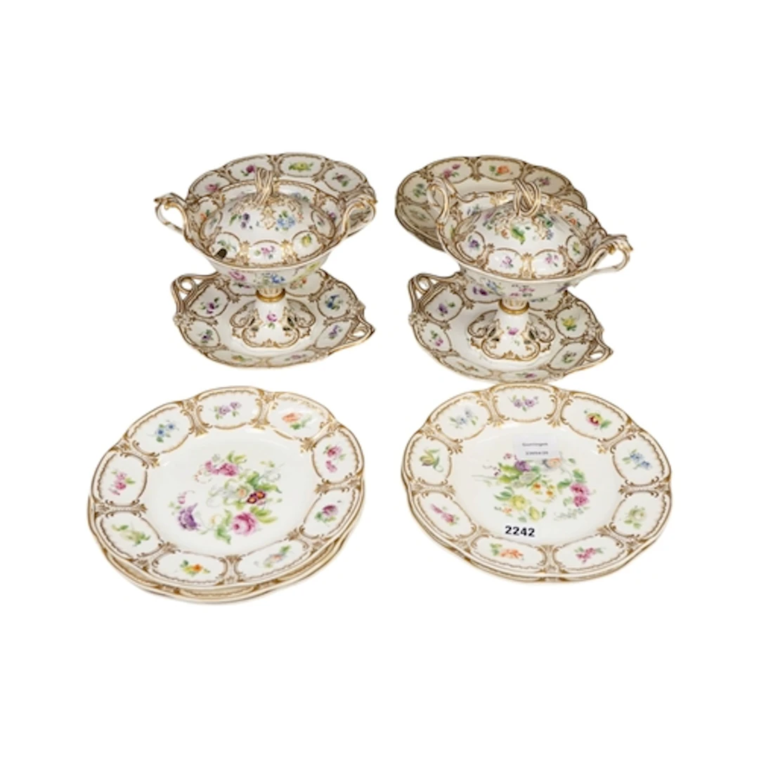 A mid 19th century English porcelain botanical dessert servi...