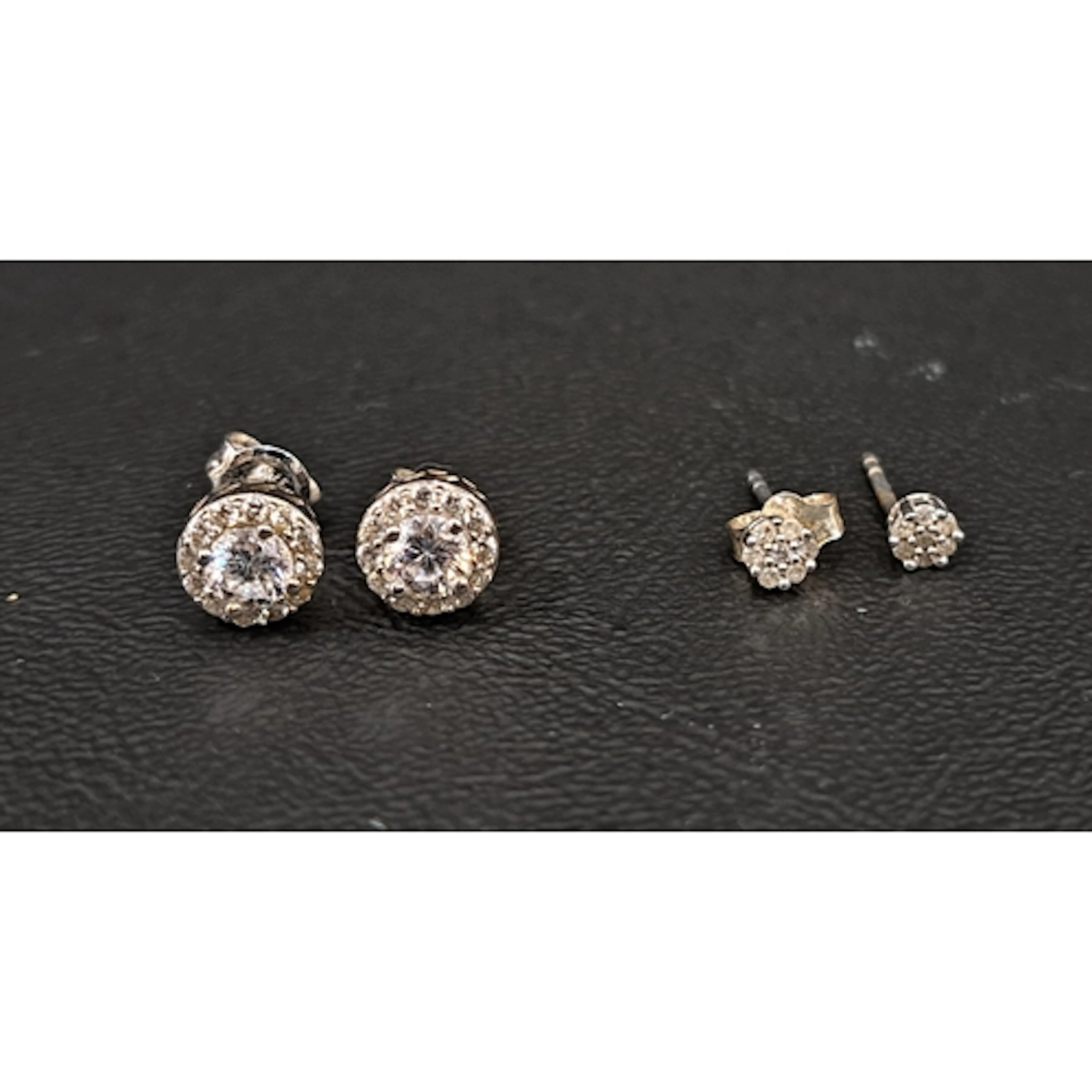 SMALL PAIR OF DIAMOND CLUSTER STID EARRINGS together with a ...