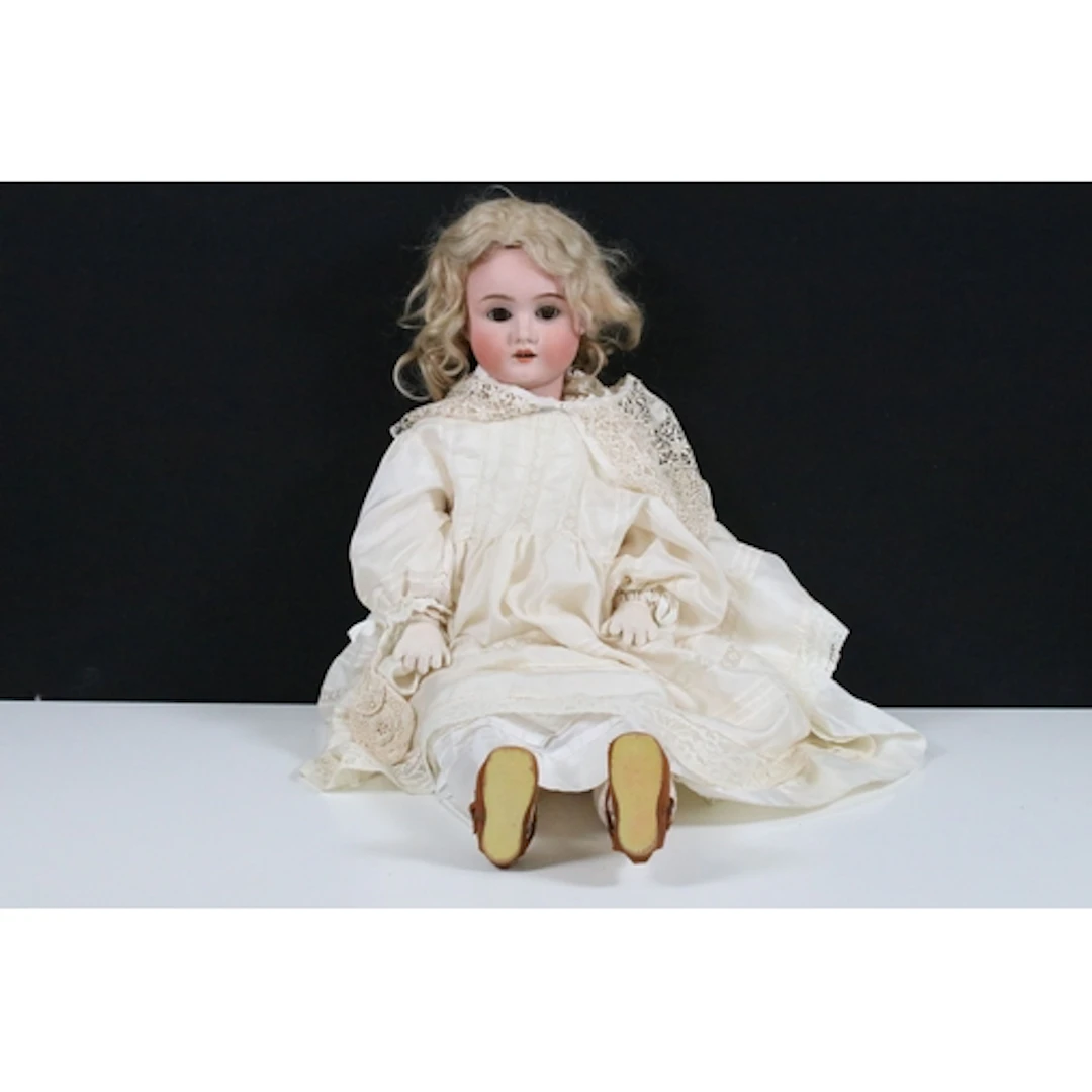 Early 20th Century German bisque headed doll with brown slee...
